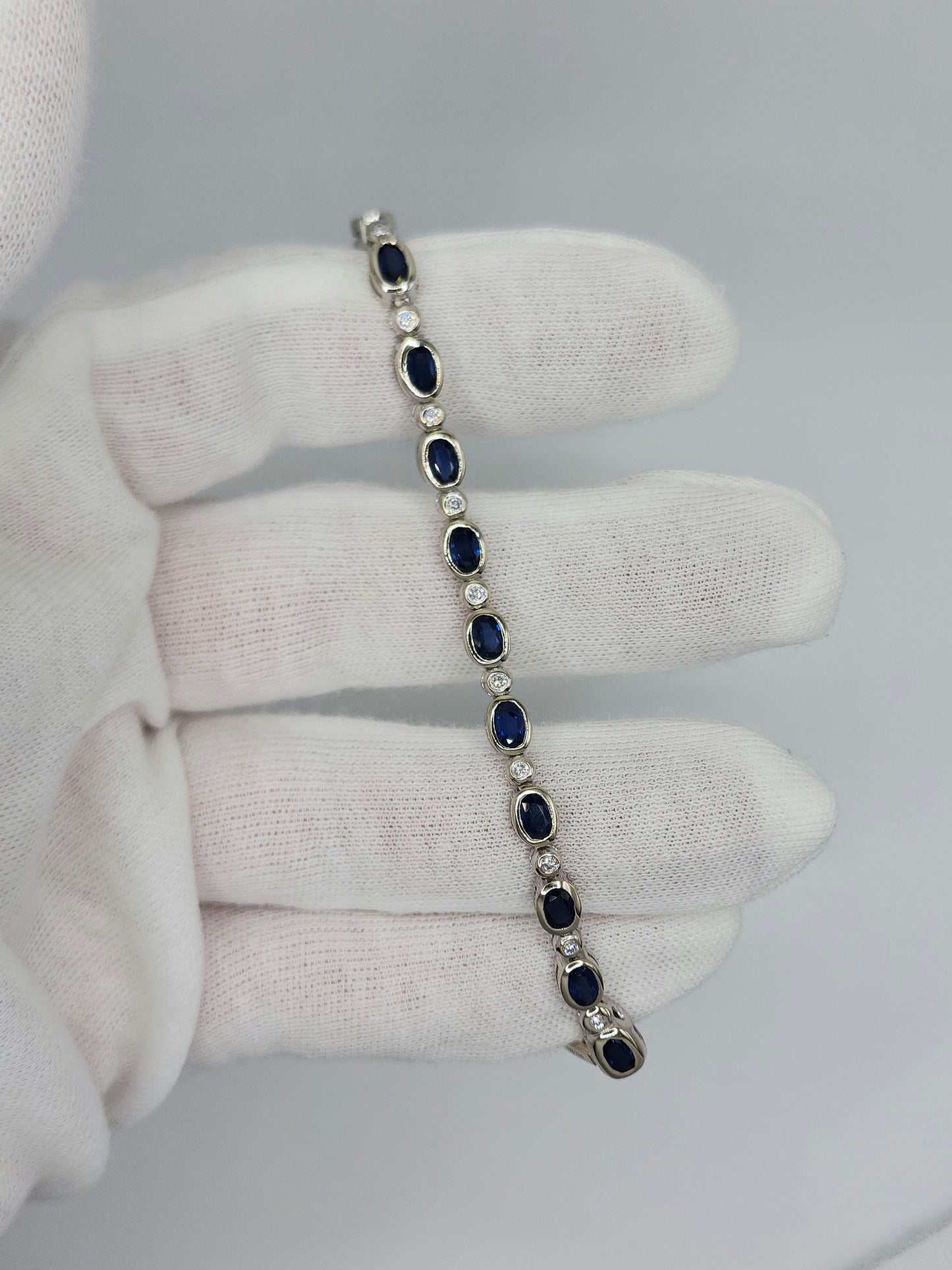 Bezel Set Sapphire and Diamond Tennis Bracelet in 14k White Gold