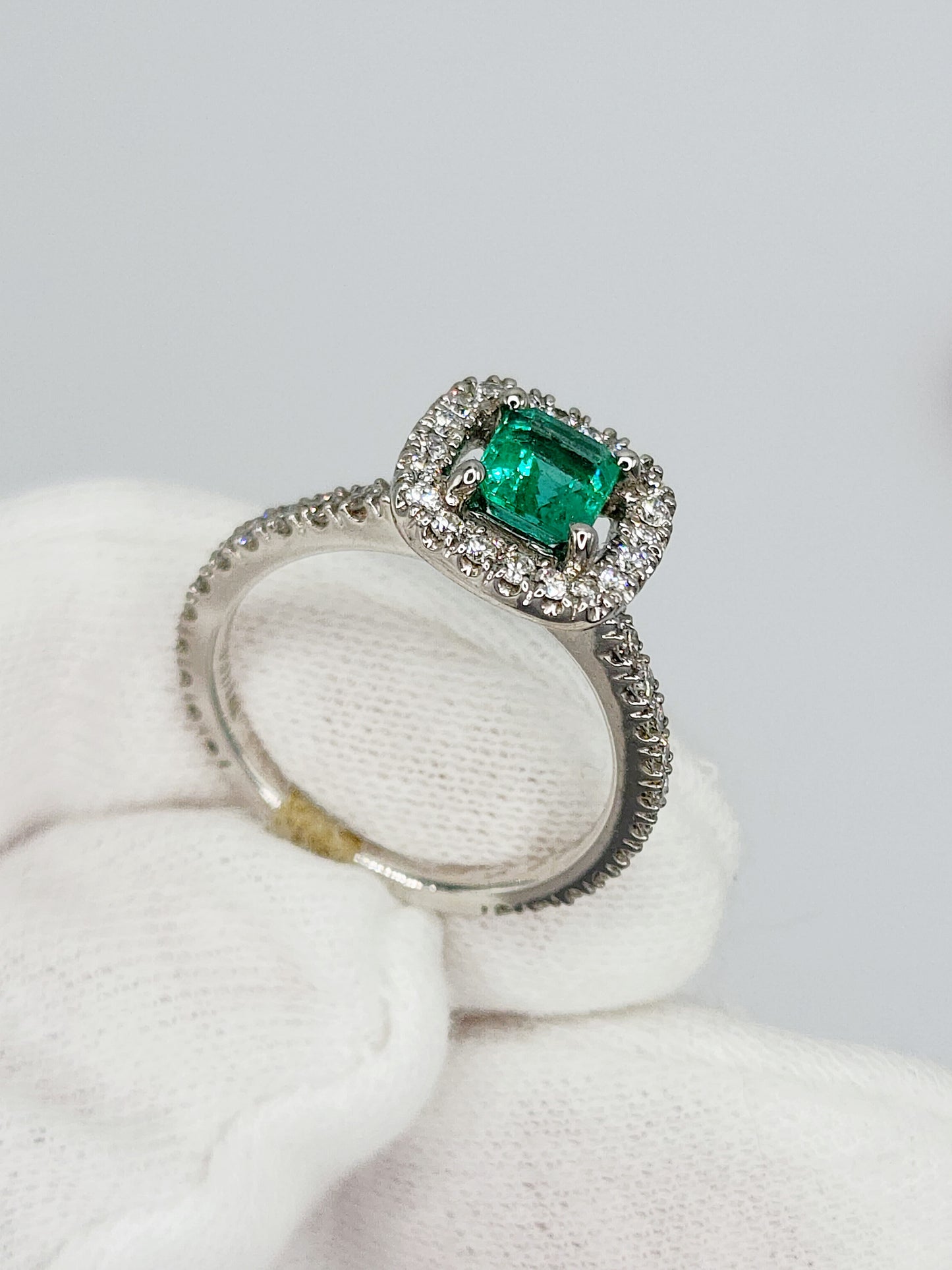 Princess Cut Emerald and Diamond Halo Engagement Ring in 18k White Gold