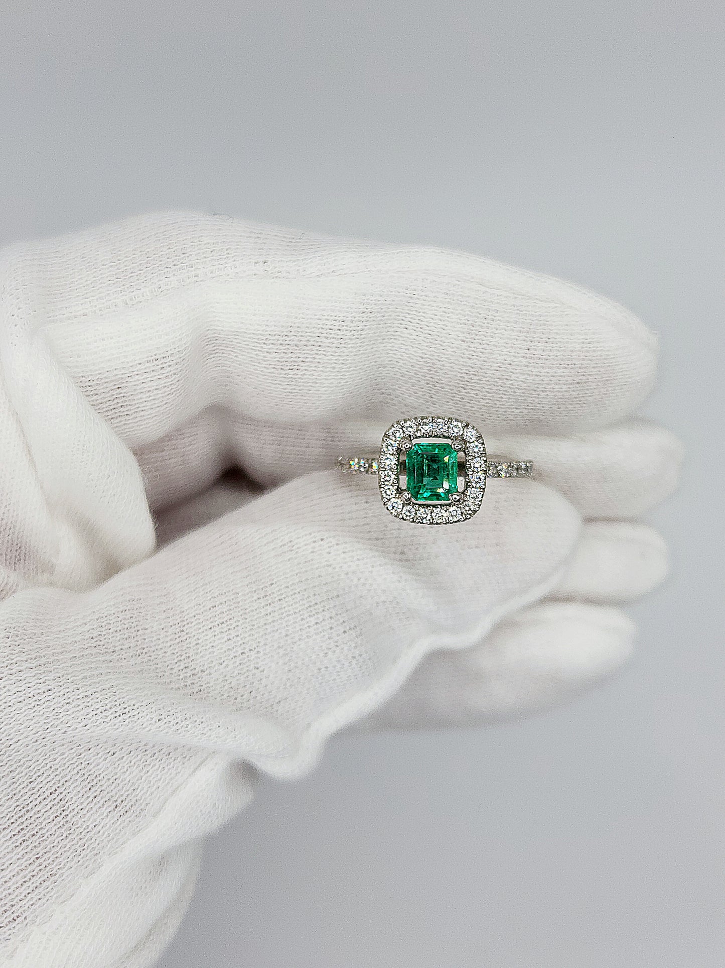 Princess Cut Emerald and Diamond Halo Engagement Ring in 18k White Gold
