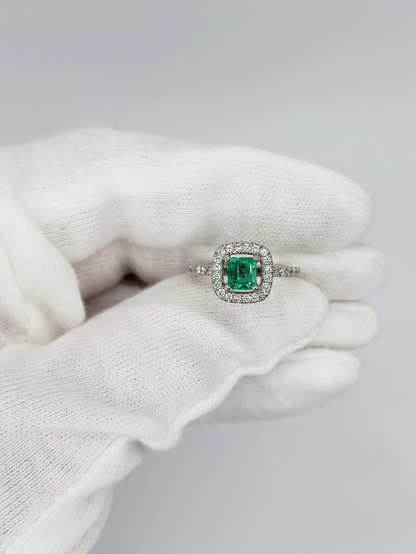 Princess Cut Emerald and Diamond Halo Engagement Ring in 18k White Gold