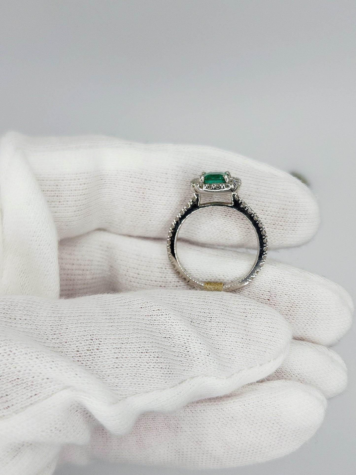 Princess Cut Emerald and Diamond Halo Engagement Ring in 18k White Gold