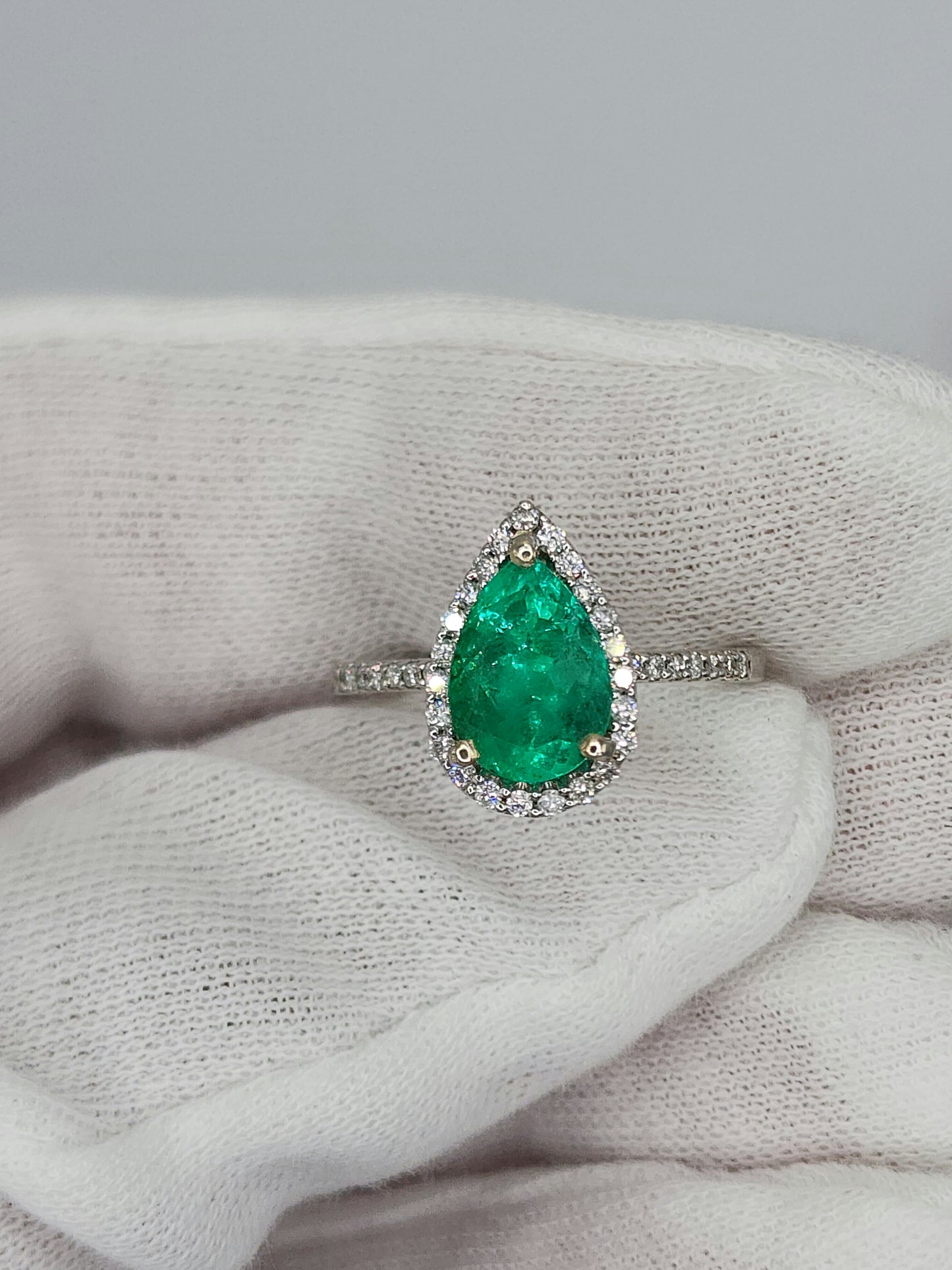 Pear Emerald and Halo Diamond Ring in 14k White Gold