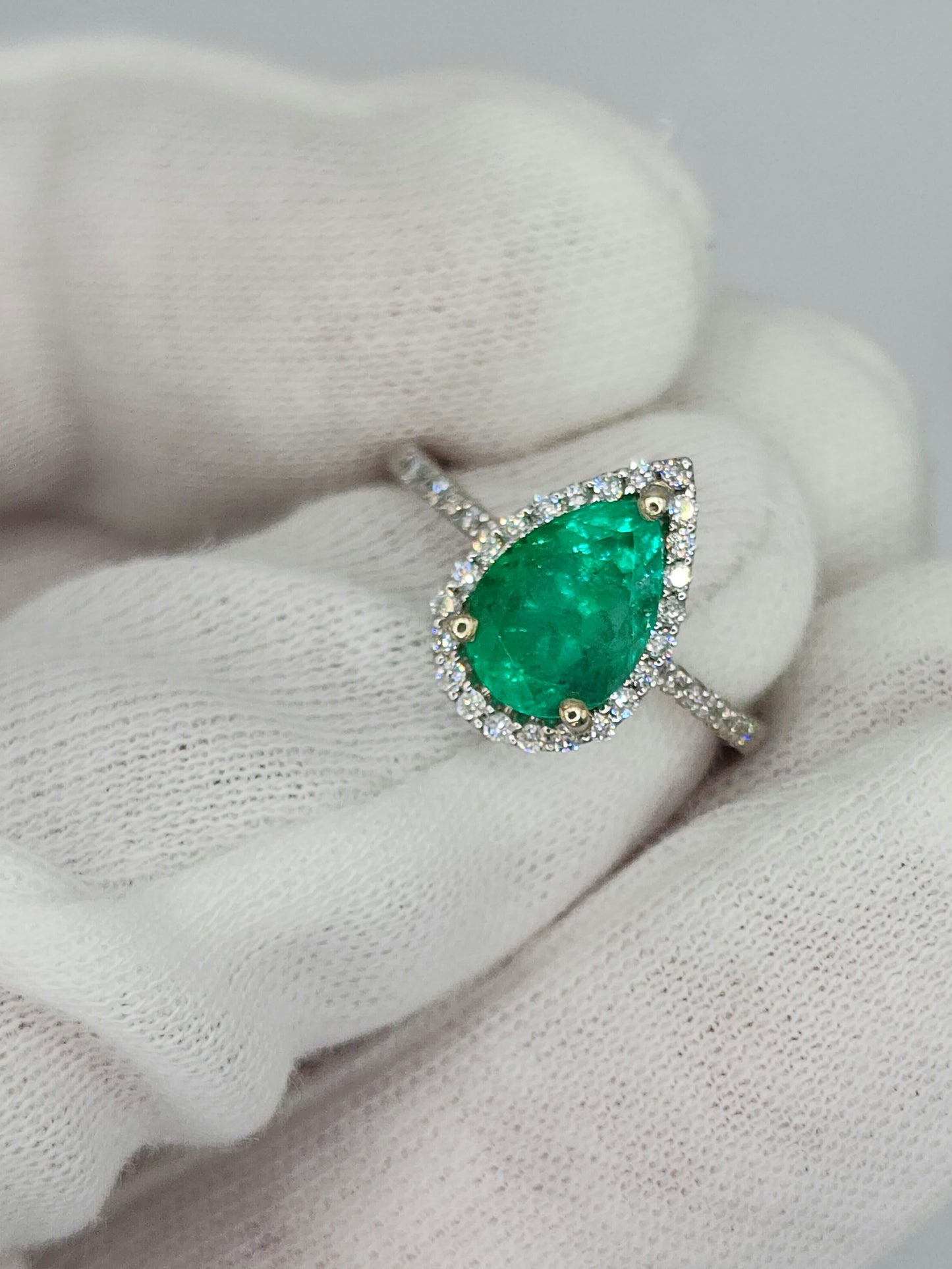 Pear Emerald and Halo Diamond Ring in 14k White Gold