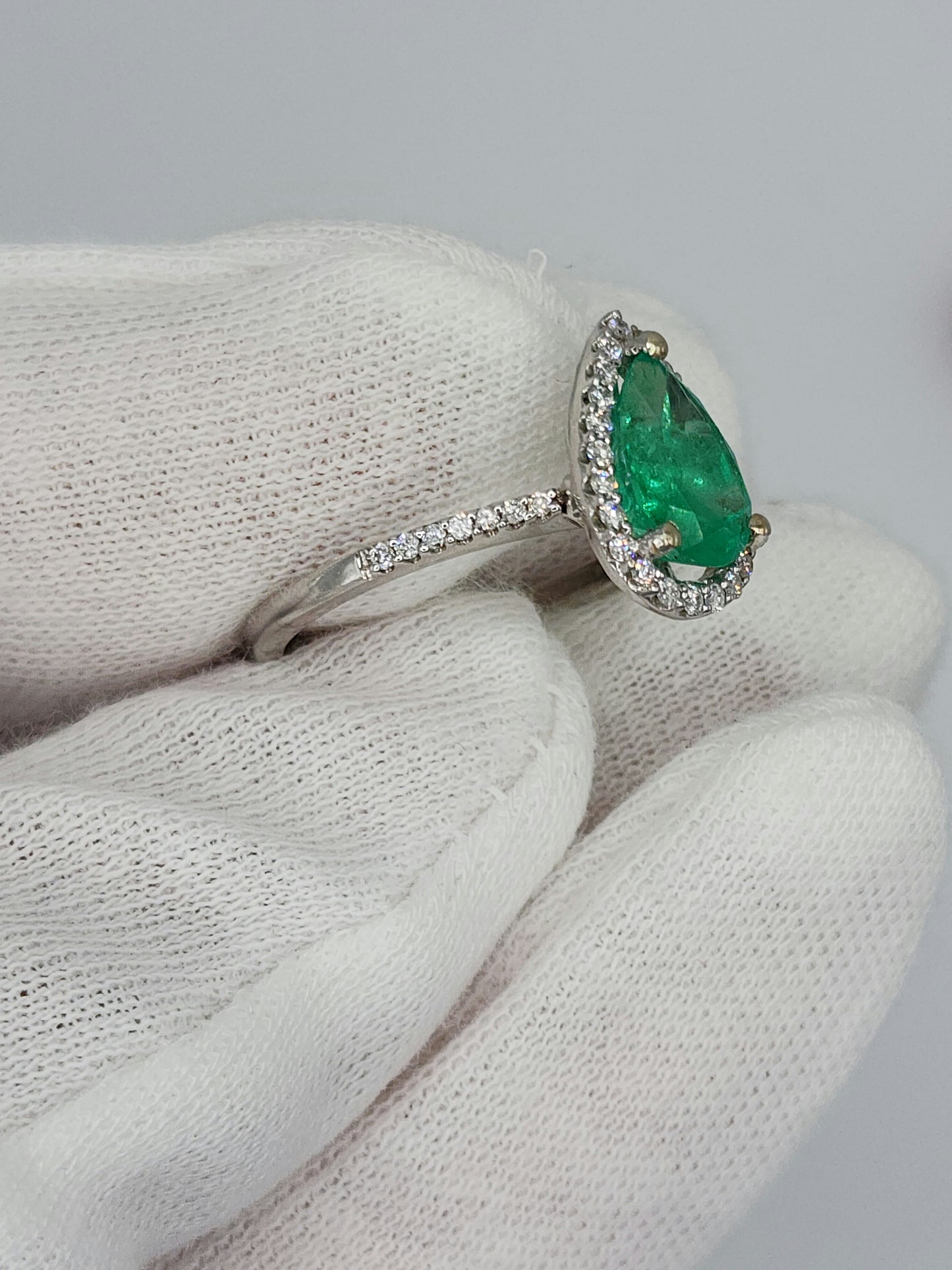 Pear Emerald and Halo Diamond Ring in 14k White Gold