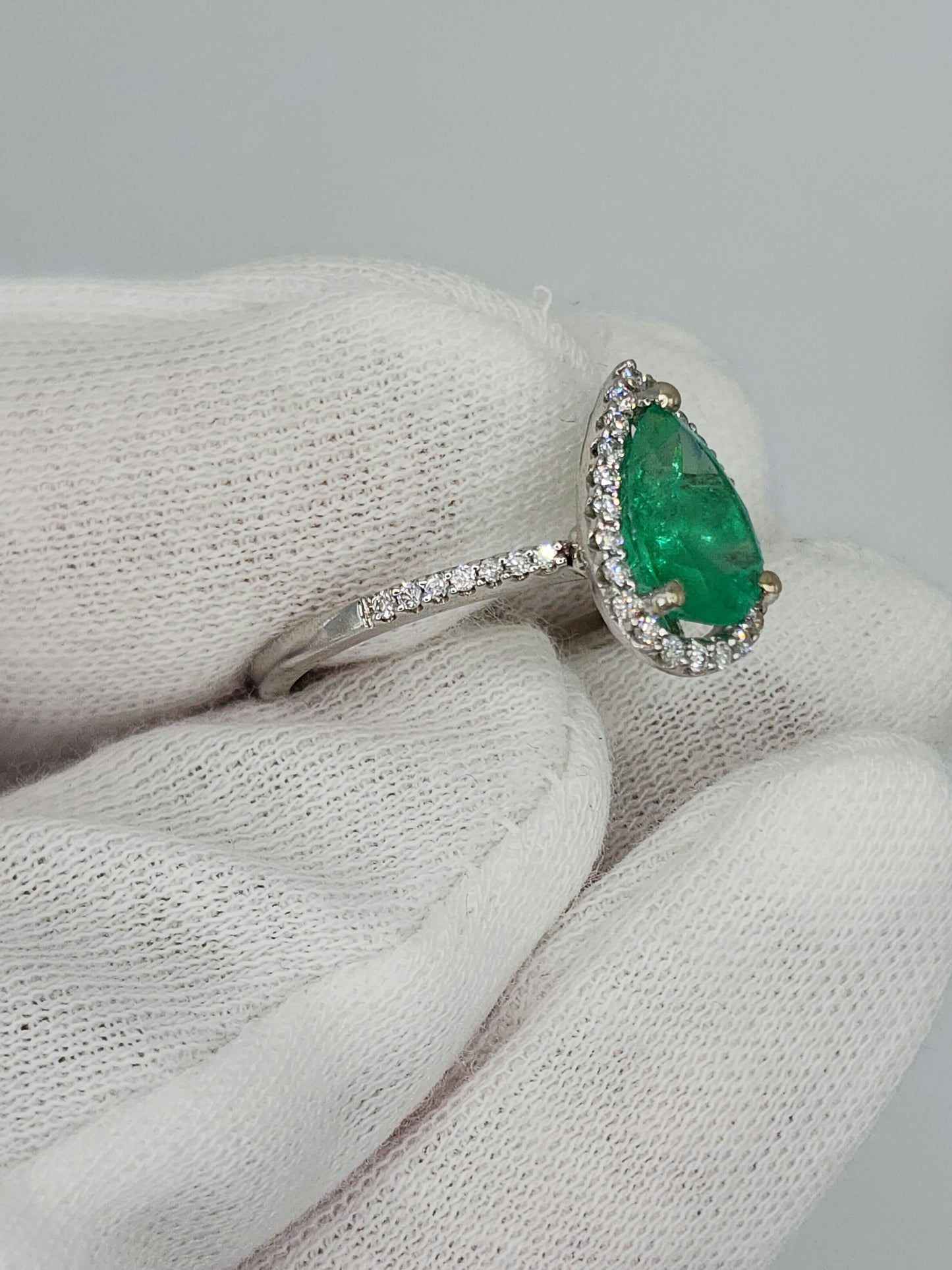 Pear Emerald and Halo Diamond Ring in 14k White Gold