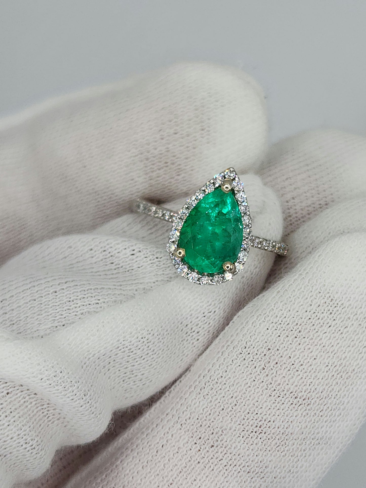 Pear Emerald and Halo Diamond Ring in 14k White Gold
