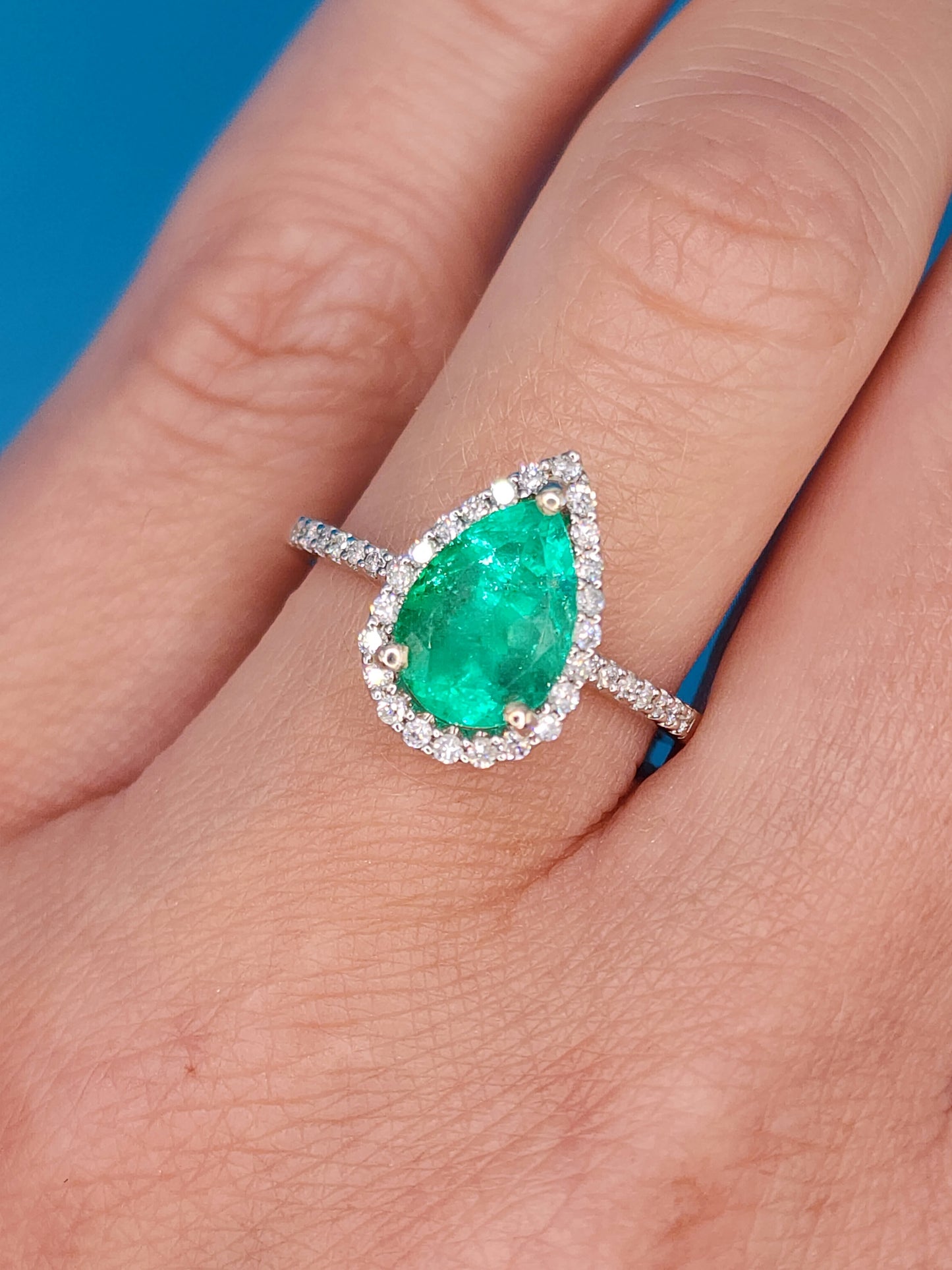 Pear Emerald and Halo Diamond Ring in 14k White Gold