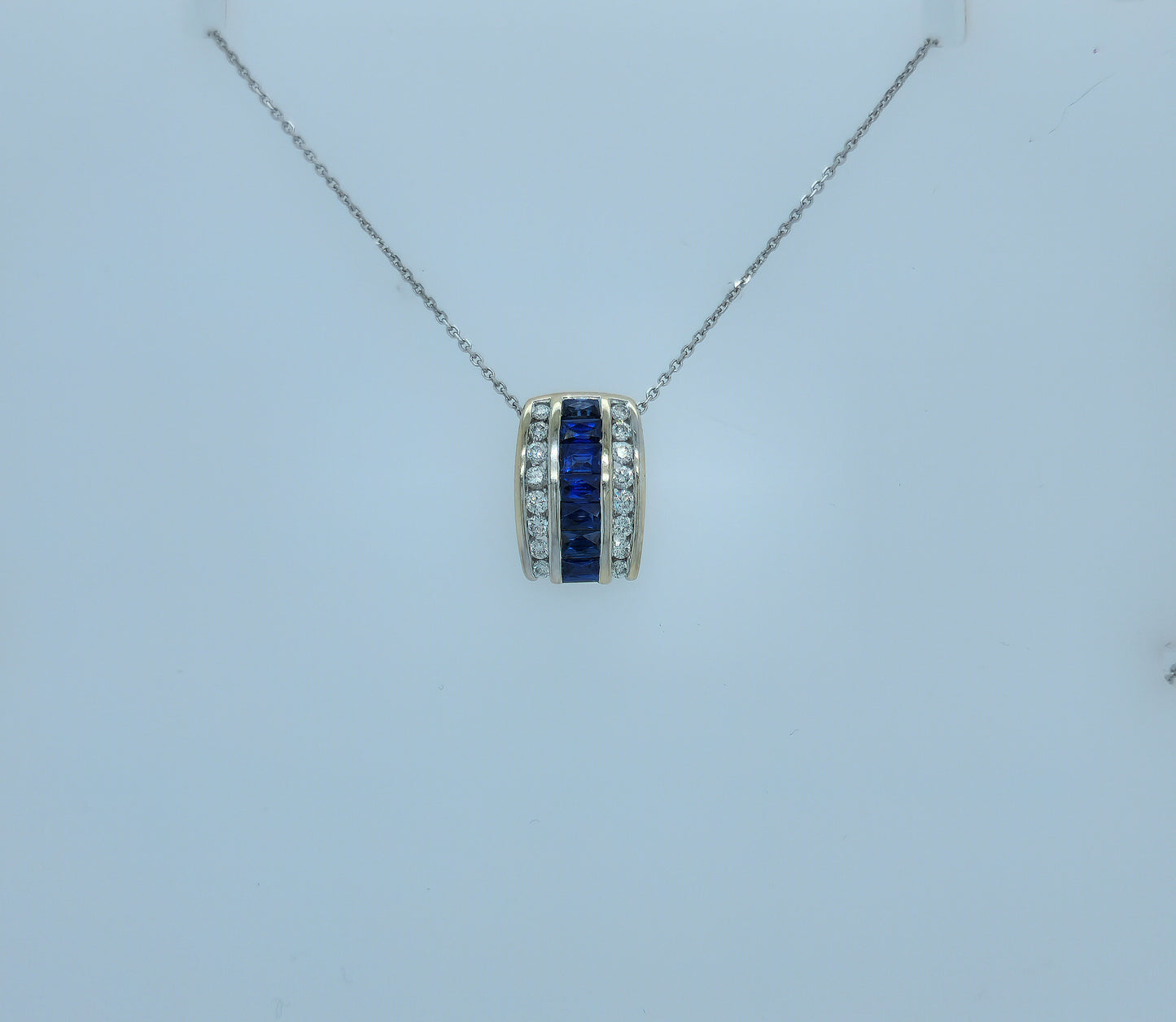 Baguette Cut Sapphire and Double Row Diamond Pendant in 18k White Gold
