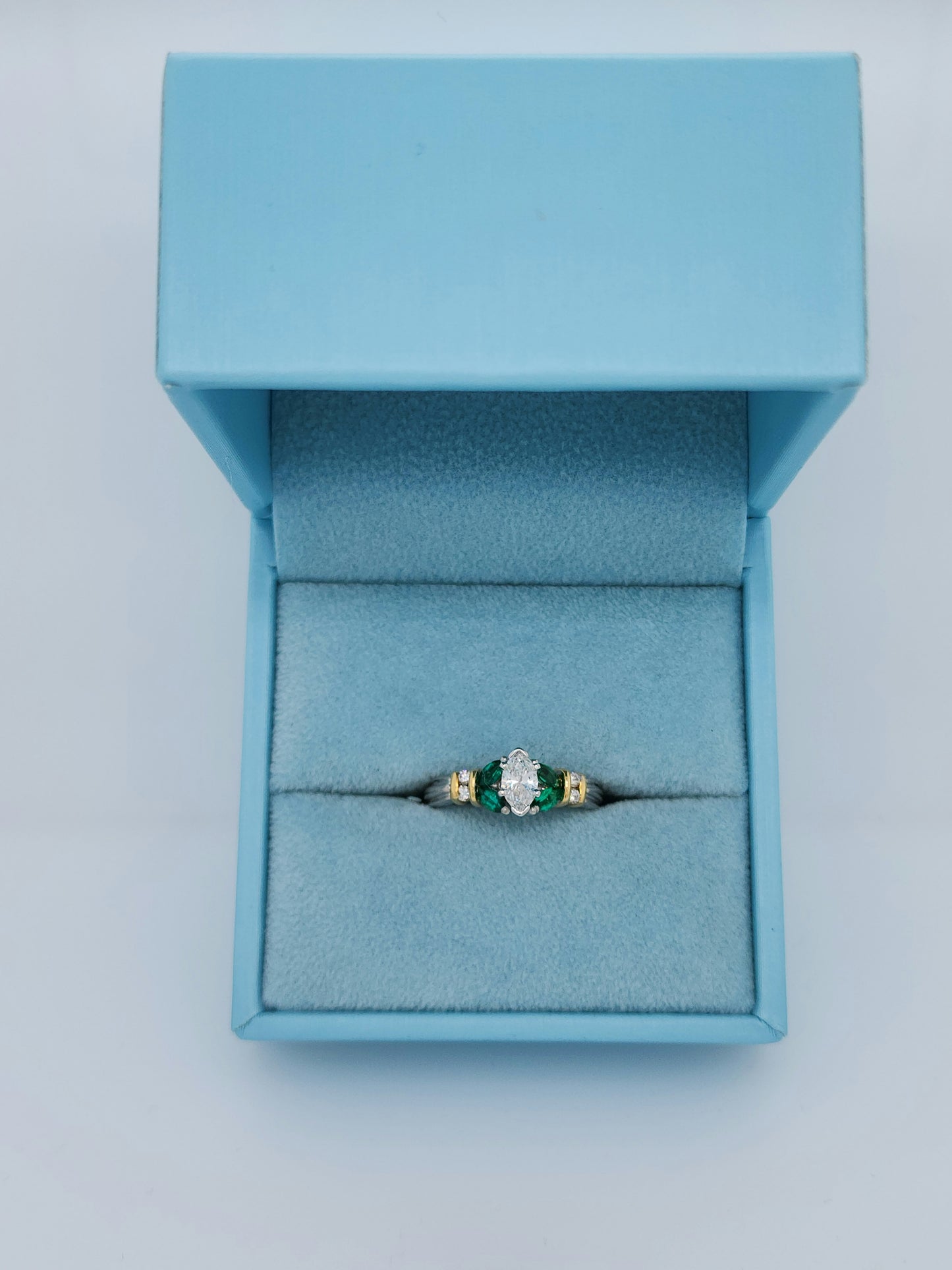 Marquise Cut Diamond and Emerald Engagement Ring in Platimun and 18k Yellow Gold
