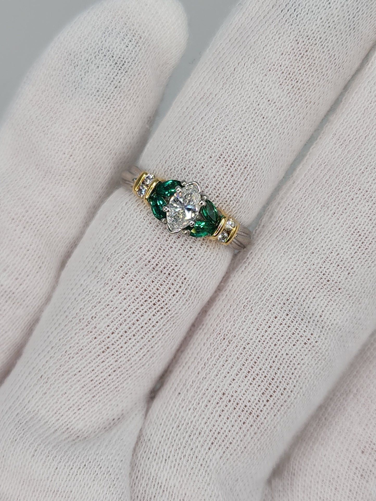 Marquise Cut Diamond and Emerald Engagement Ring in Platimun and 18k Yellow Gold