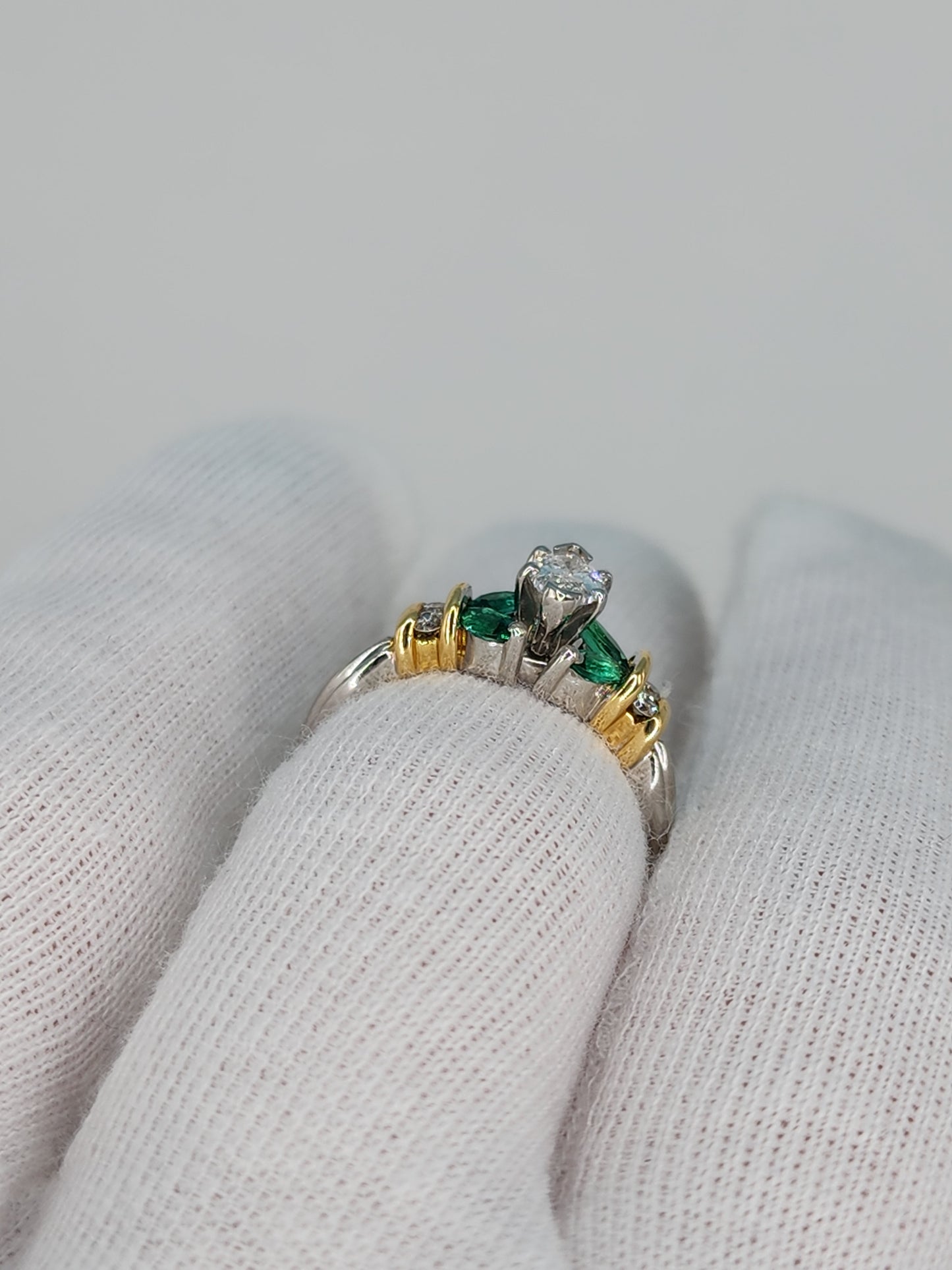 Marquise Cut Diamond and Emerald Engagement Ring in Platimun and 18k Yellow Gold