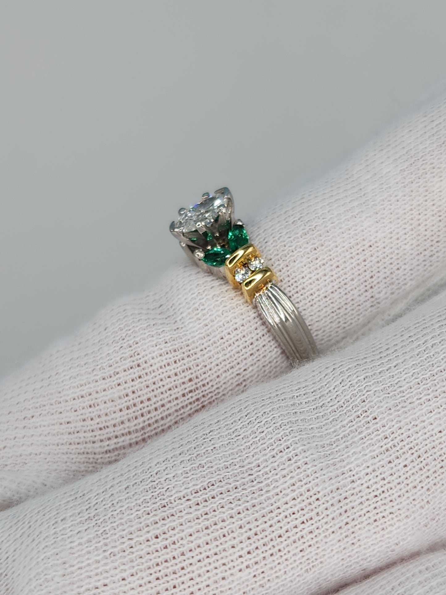 Marquise Cut Diamond and Emerald Engagement Ring in Platimun and 18k Yellow Gold