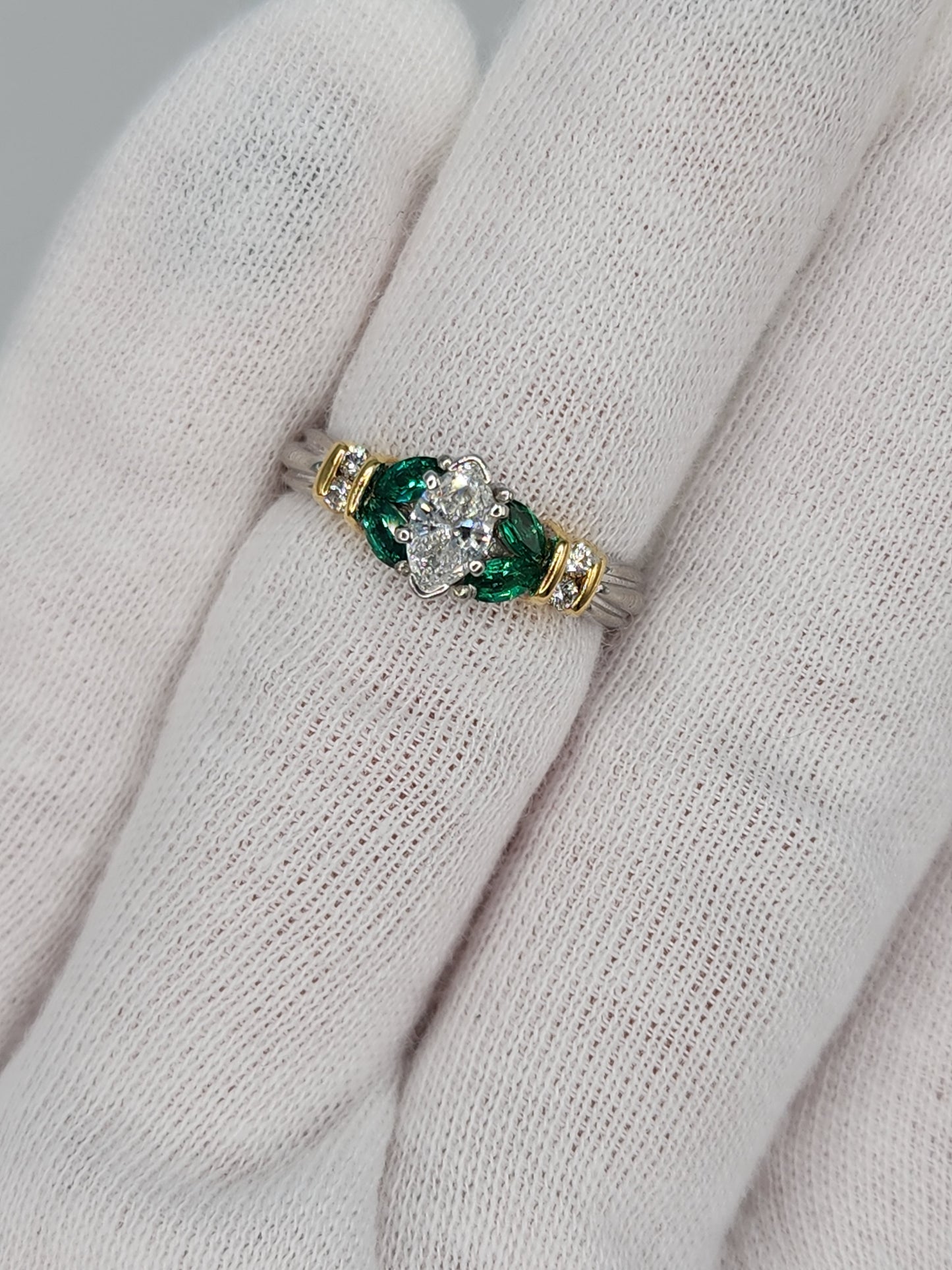 Marquise Cut Diamond and Emerald Engagement Ring in Platimun and 18k Yellow Gold