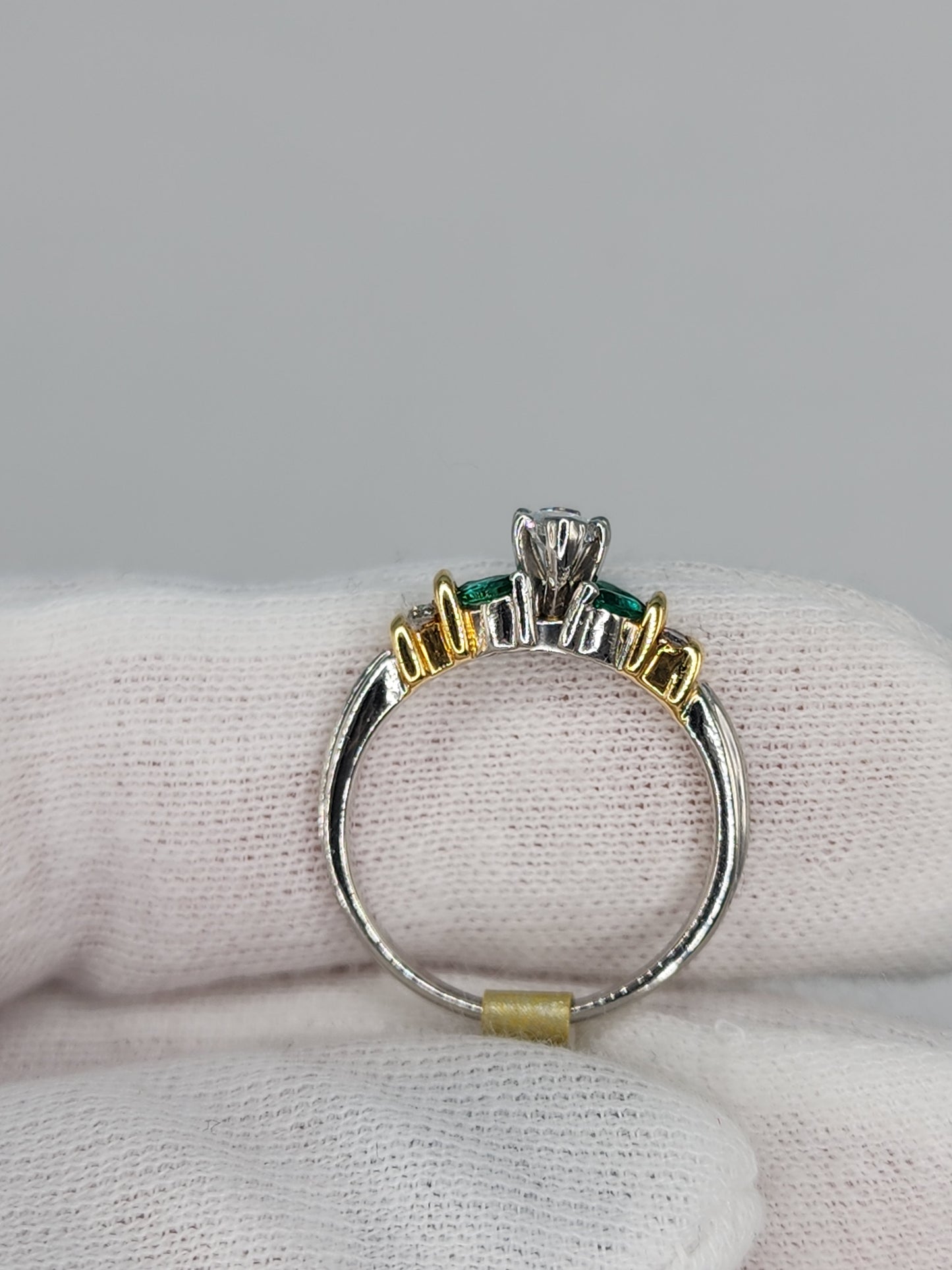 Marquise Cut Diamond and Emerald Engagement Ring in Platimun and 18k Yellow Gold