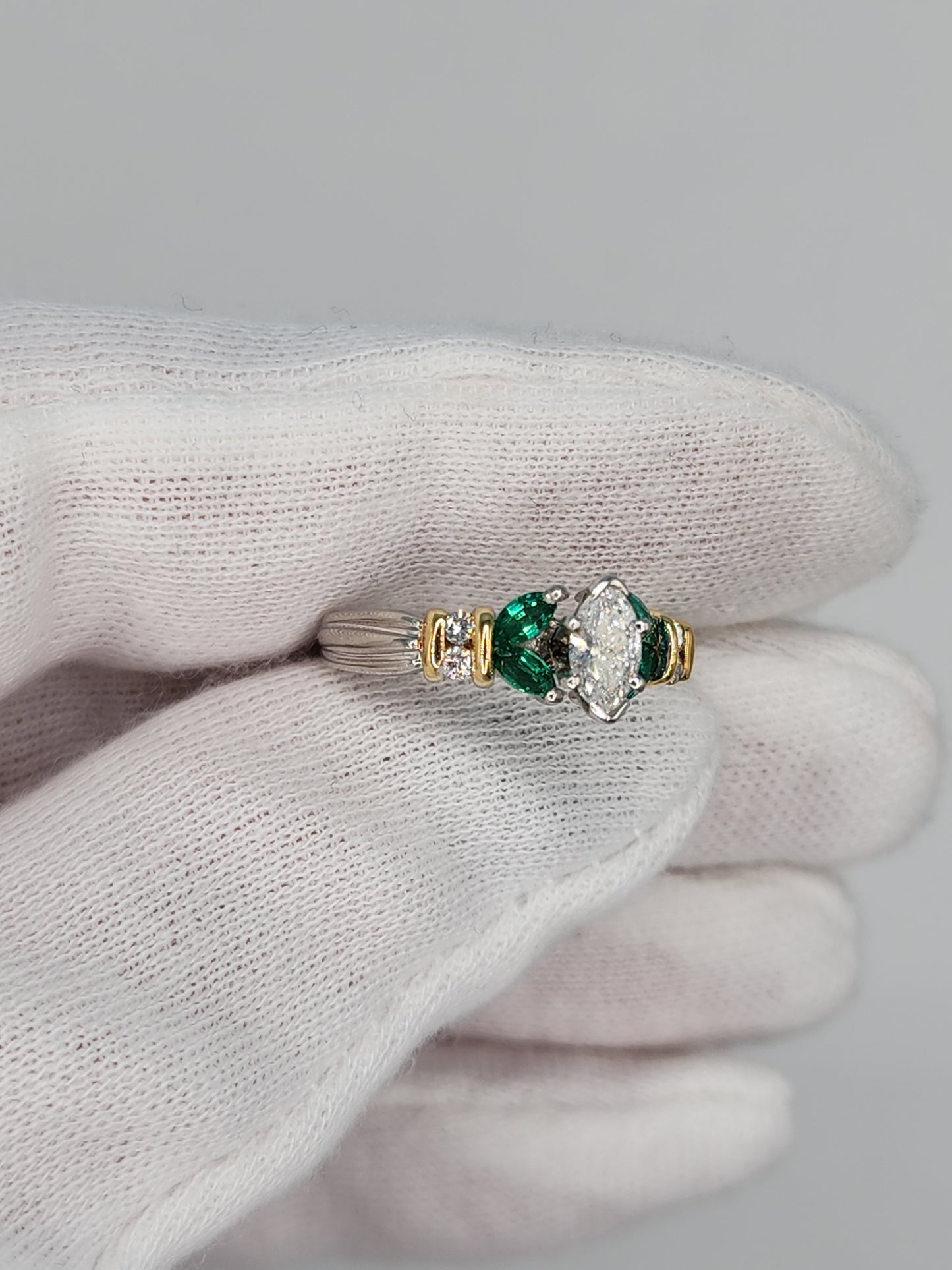 Marquise Cut Diamond and Emerald Engagement Ring in Platimun and 18k Yellow Gold
