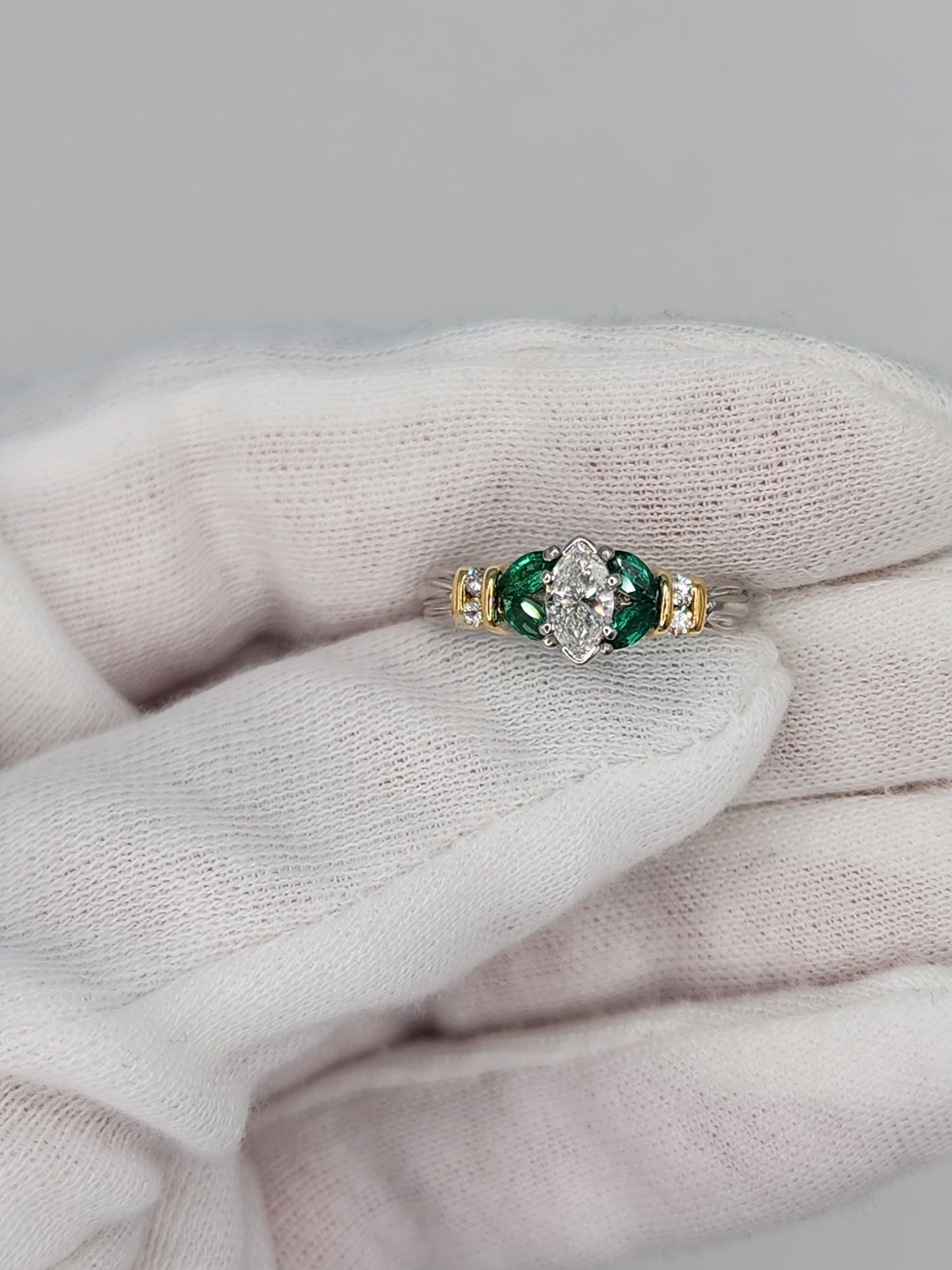 Marquise Cut Diamond and Emerald Engagement Ring in Platimun and 18k Yellow Gold