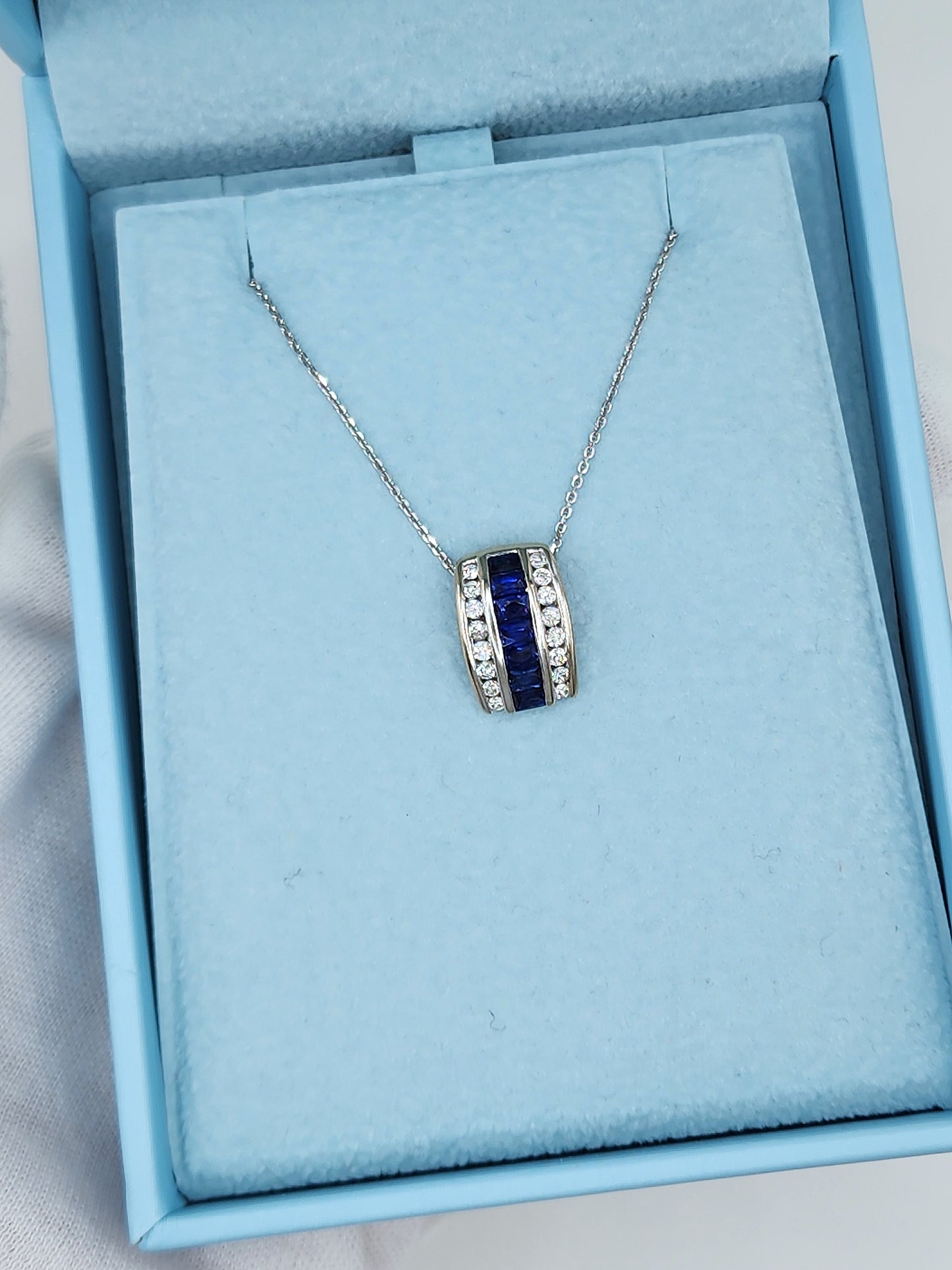 Baguette Cut Sapphire and Double Row Diamond Pendant in 18k White Gold