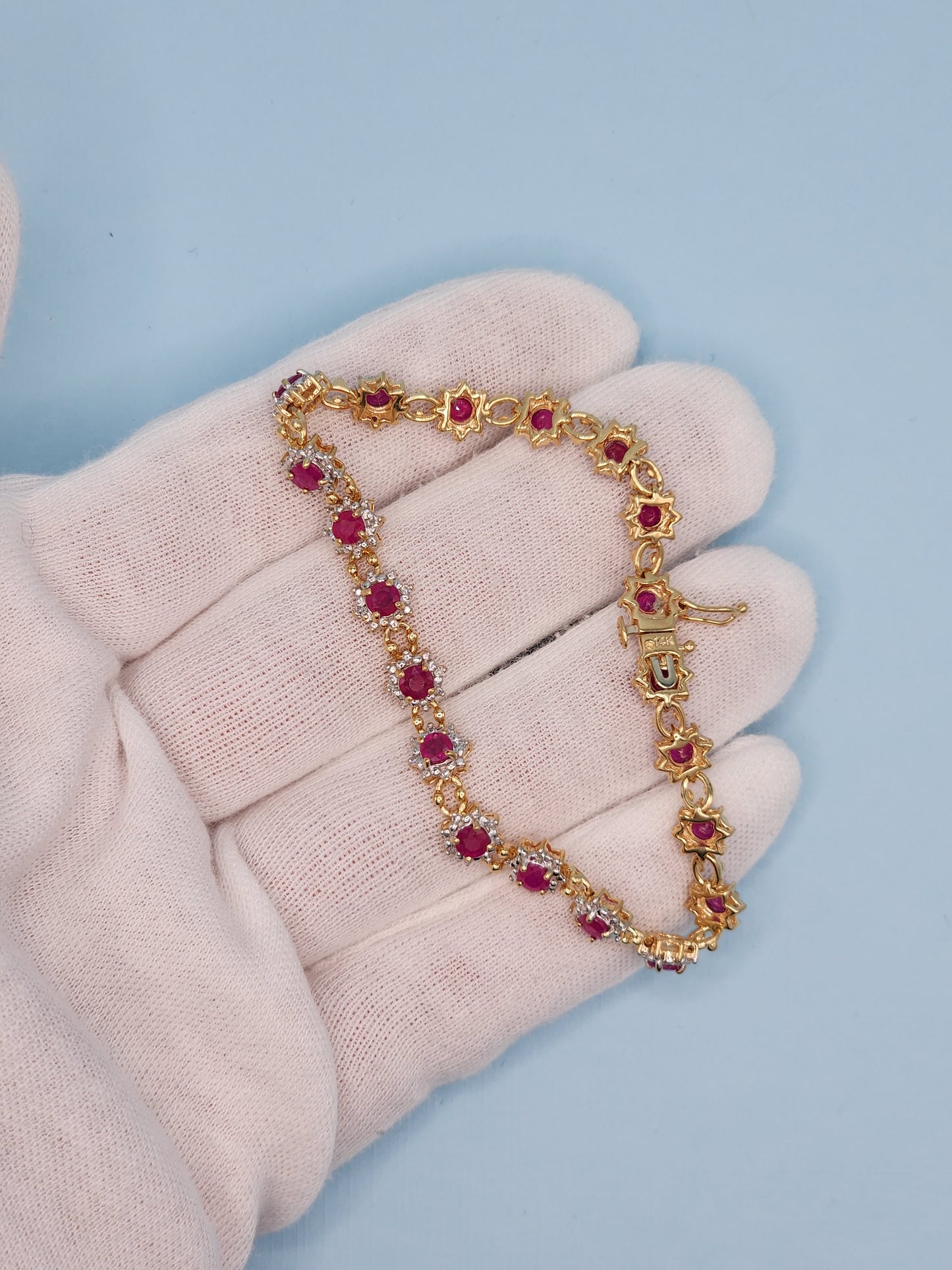 Ladies Flower Motif Ruby and Diamond Tennis Bracelet in 14k Yellow Gold