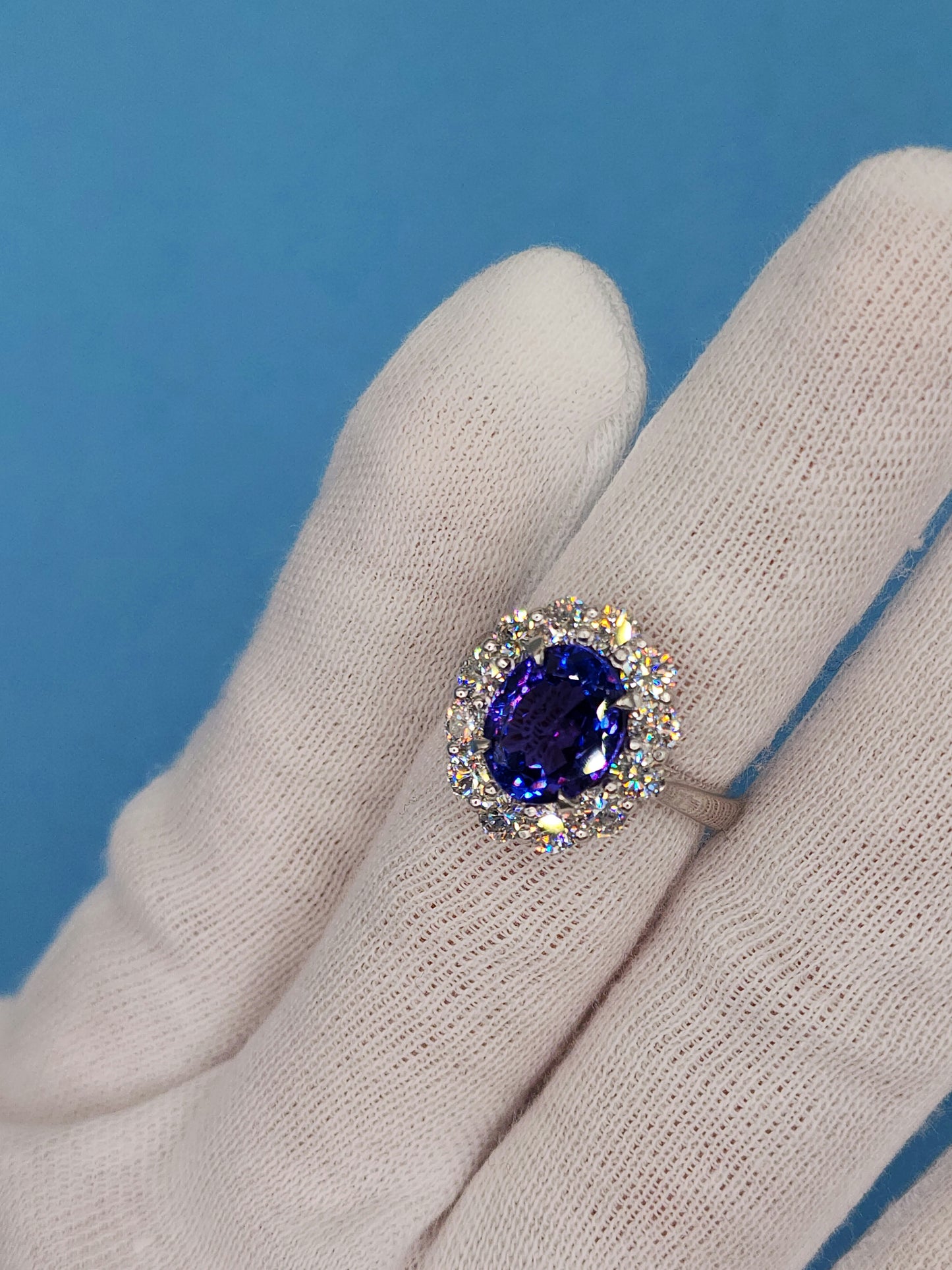 AAA Natural Oval Tanzanite and Diamond Halo Ladies Ring in 18k White Gold