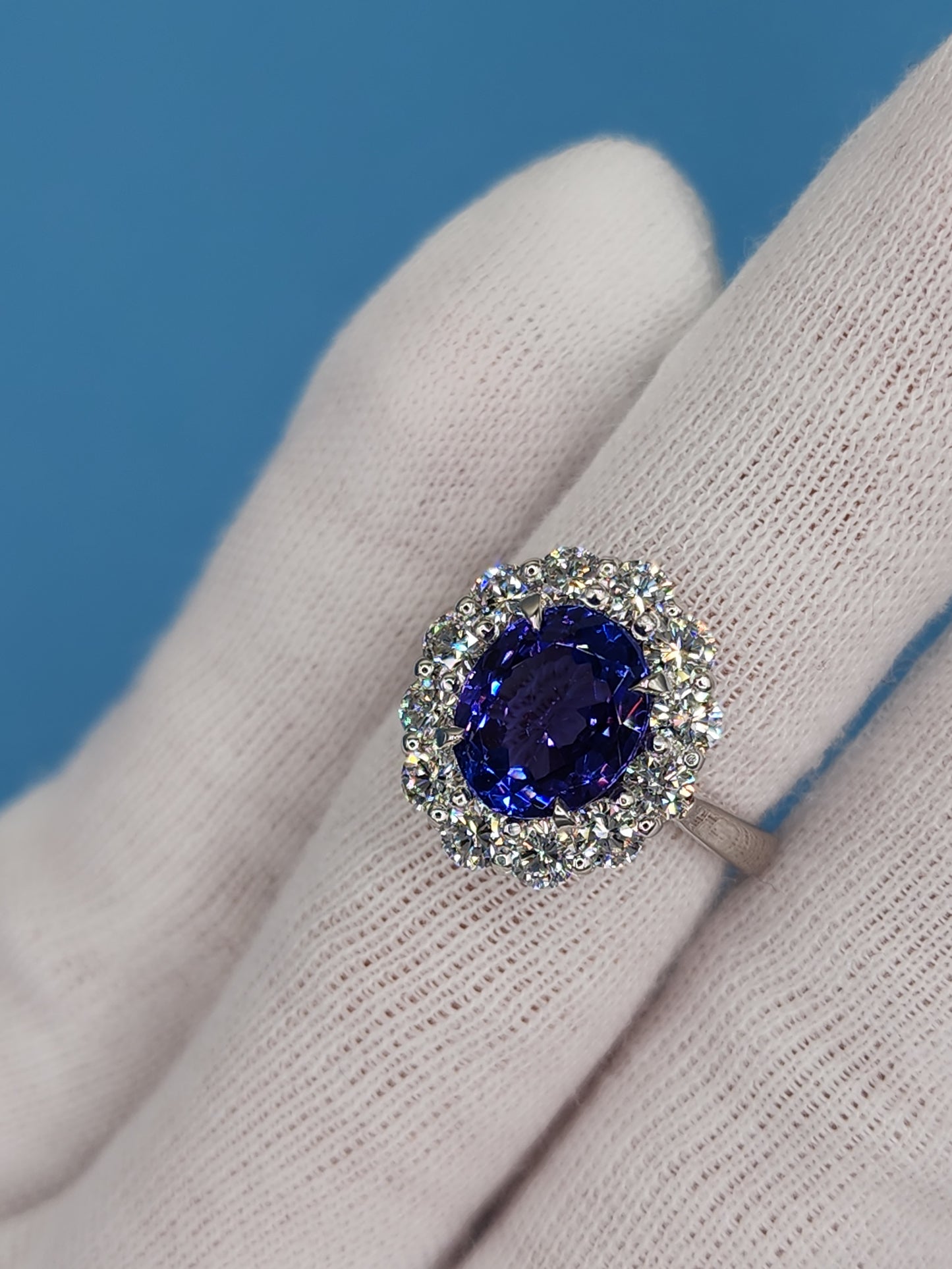 AAA Natural Oval Tanzanite and Diamond Halo Ladies Ring in 18k White Gold