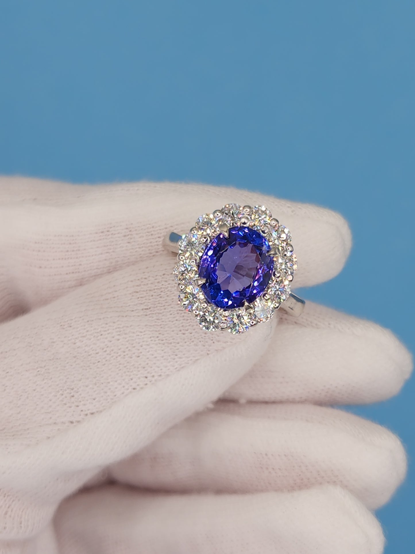AAA Natural Oval Tanzanite and Diamond Halo Ladies Ring in 18k White Gold