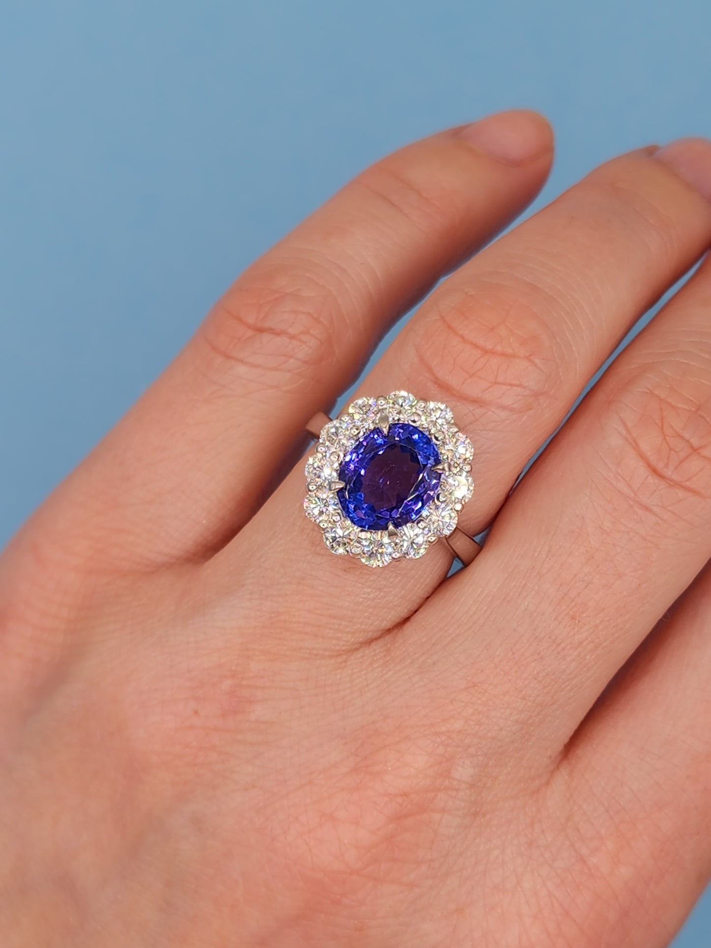 AAA Natural Oval Tanzanite and Diamond Halo Ladies Ring in 18k White Gold