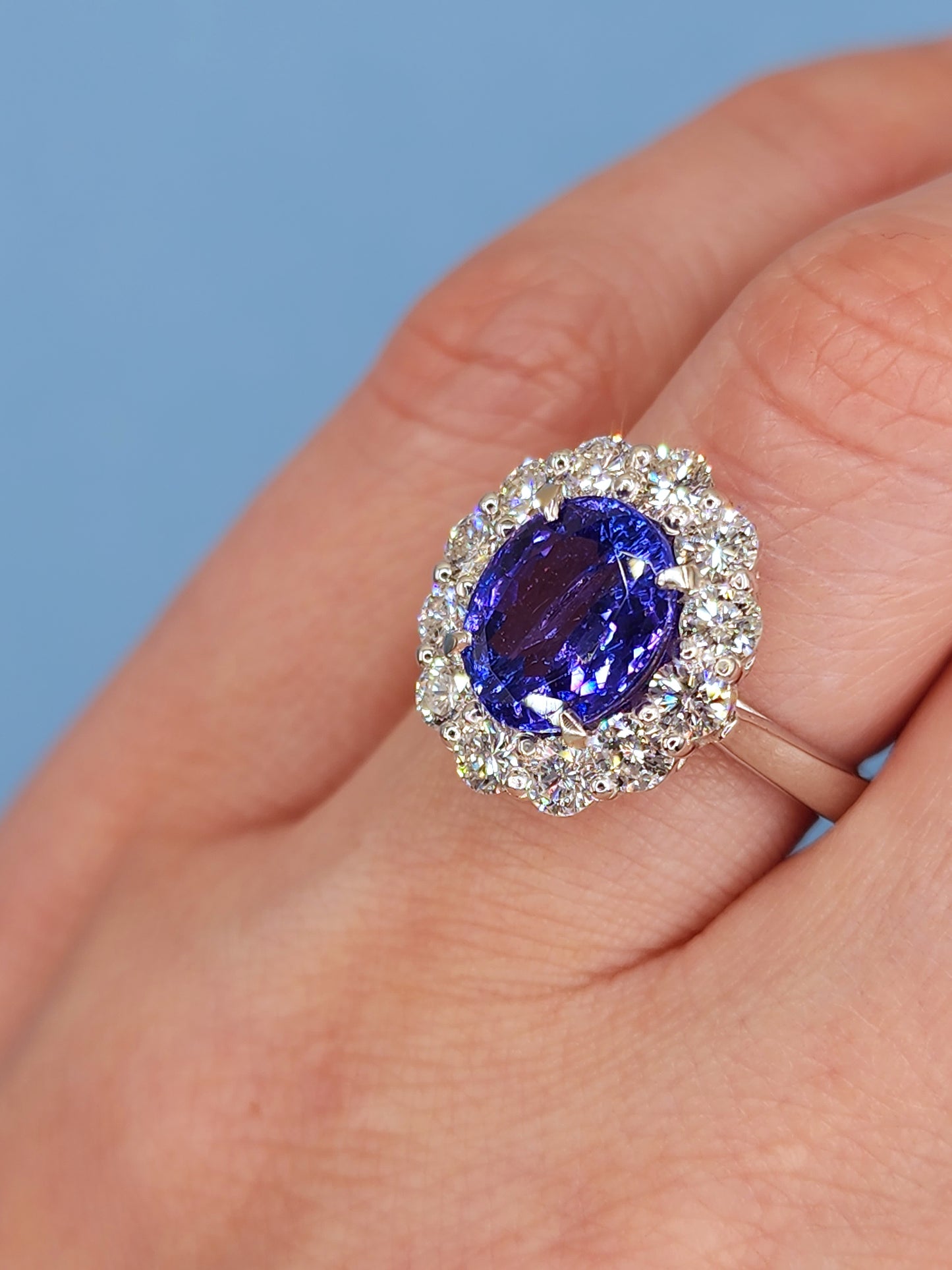 AAA Natural Oval Tanzanite and Diamond Halo Ladies Ring in 18k White Gold
