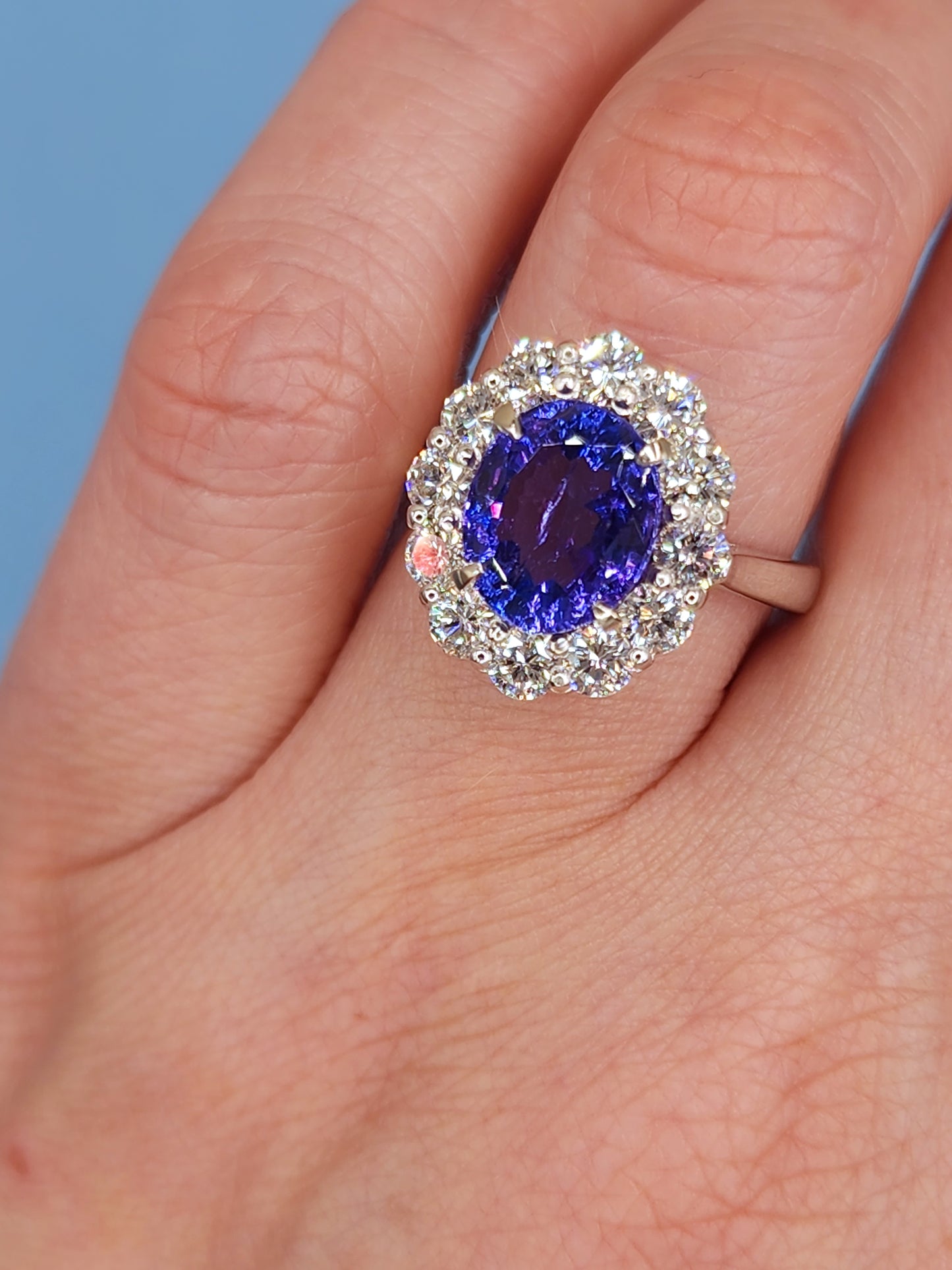 AAA Natural Oval Tanzanite and Diamond Halo Ladies Ring in 18k White Gold