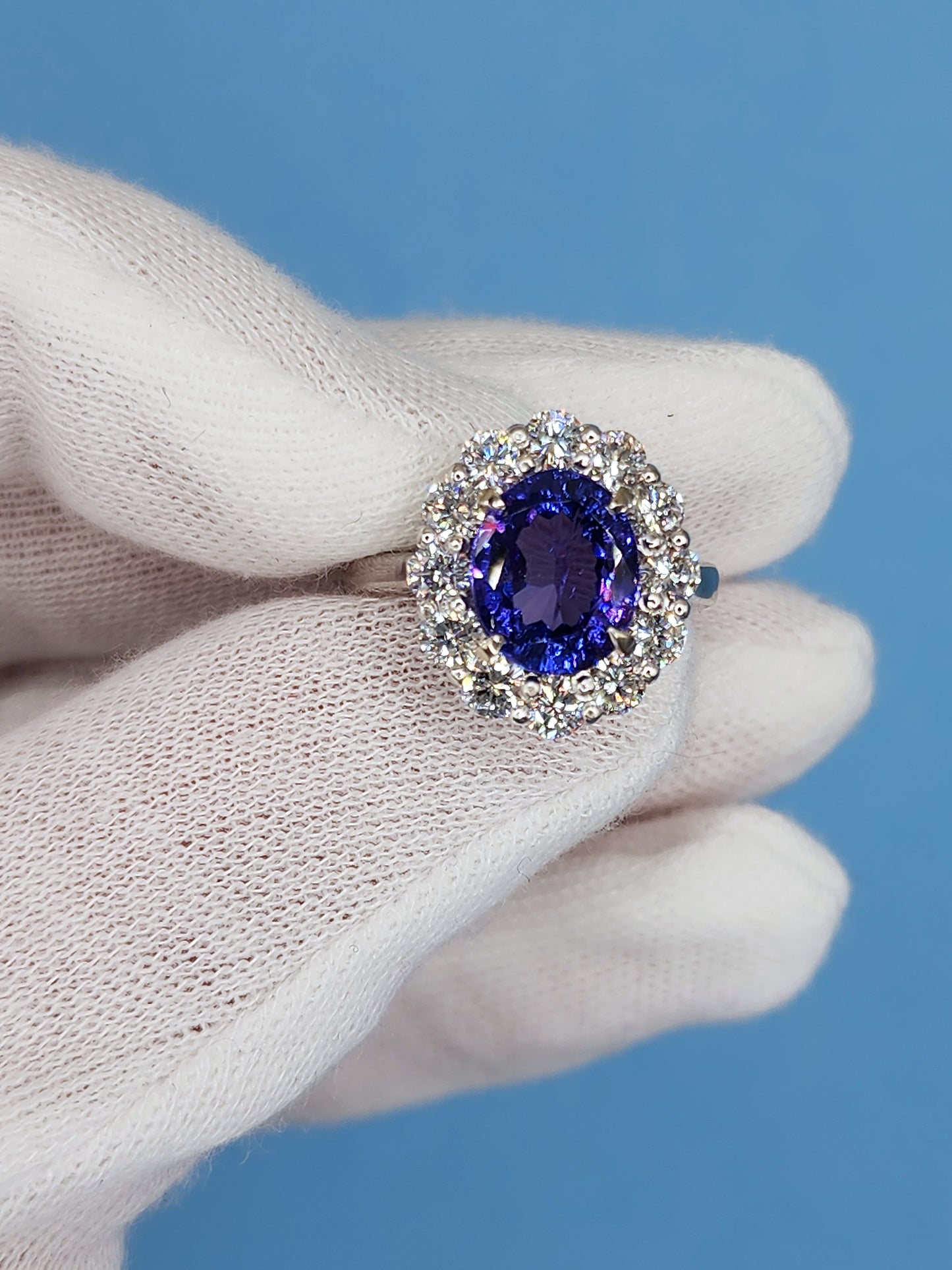 AAA Natural Oval Tanzanite and Diamond Halo Ladies Ring in 18k White Gold