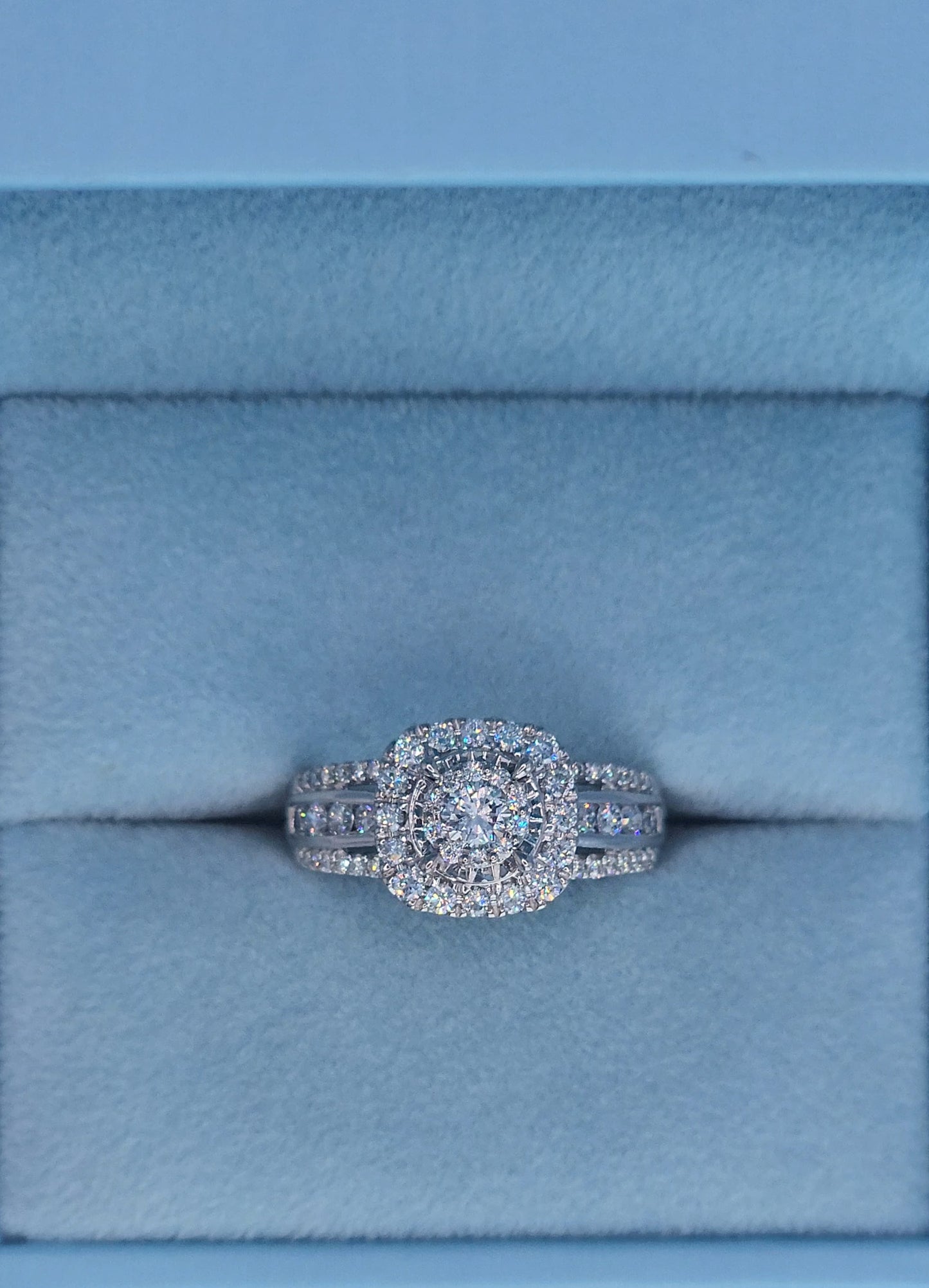 10k white gold diamond engagement ring with cushion-shaped double halo and three-row shank, 1 carat total diamond weight, size 7, cluster setting.