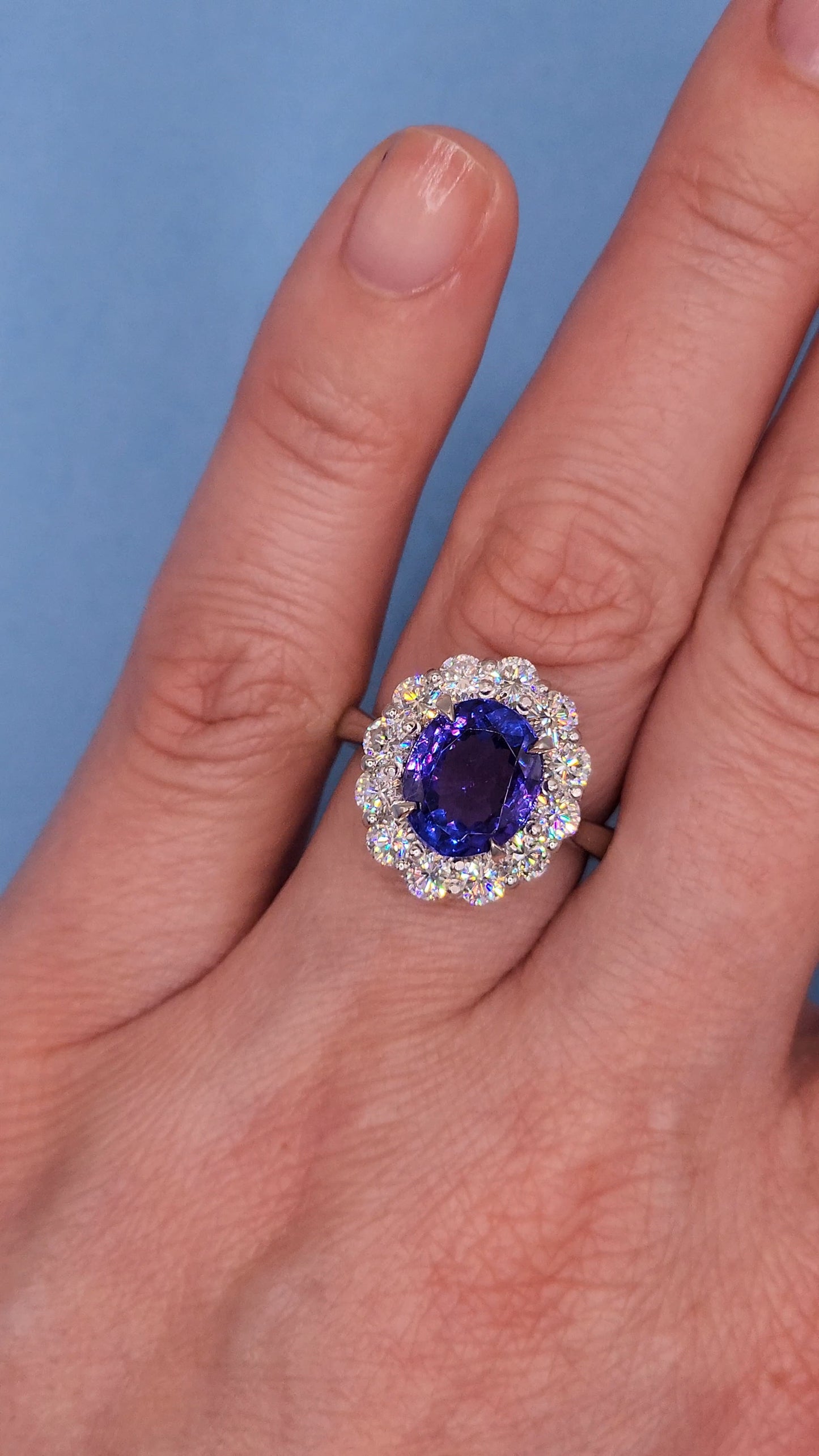 AAA Natural Oval Tanzanite and Diamond Halo Ladies Ring in 18k White Gold