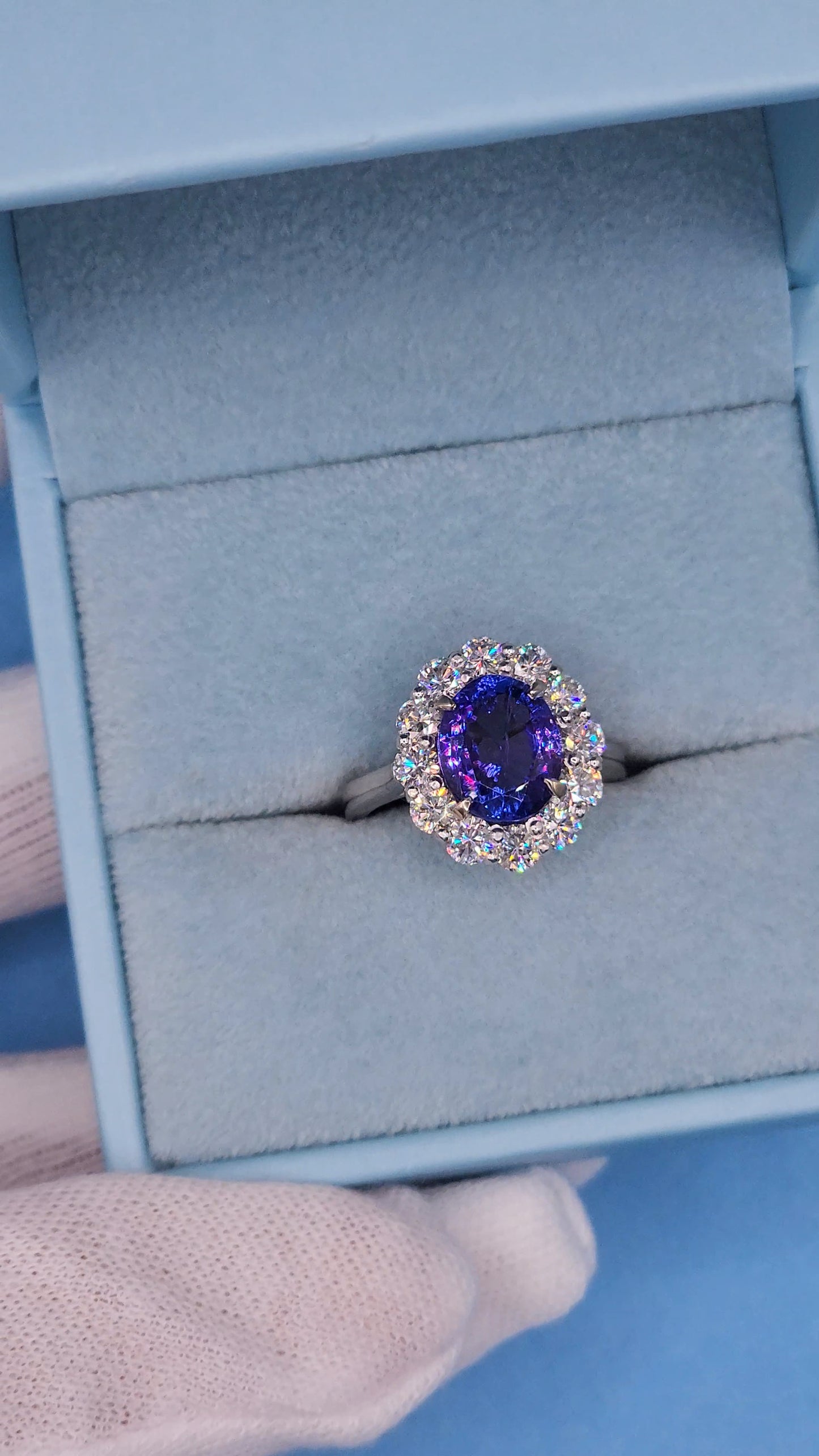AAA Natural Oval Tanzanite and Diamond Halo Ladies Ring in 18k White Gold
