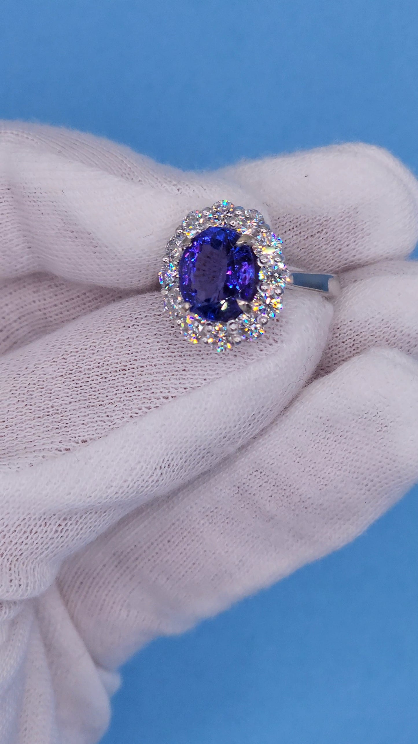 AAA Natural Oval Tanzanite and Diamond Halo Ladies Ring in 18k White Gold