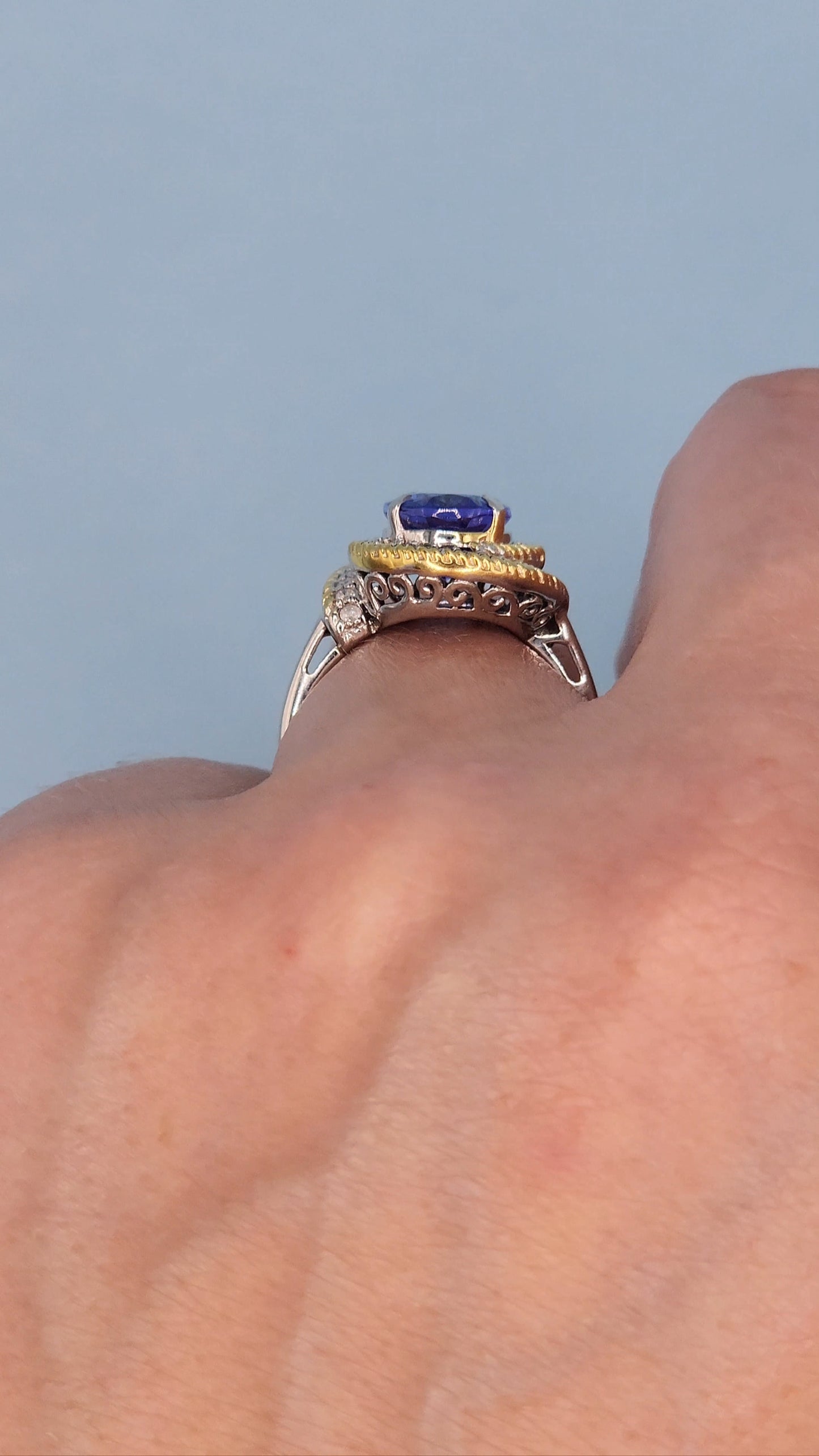 10k White Gold Halo Ring with 2.98 Carat Oval Tanzanite Wrapped in Yellow Rope Design and Diamonds – Size 6