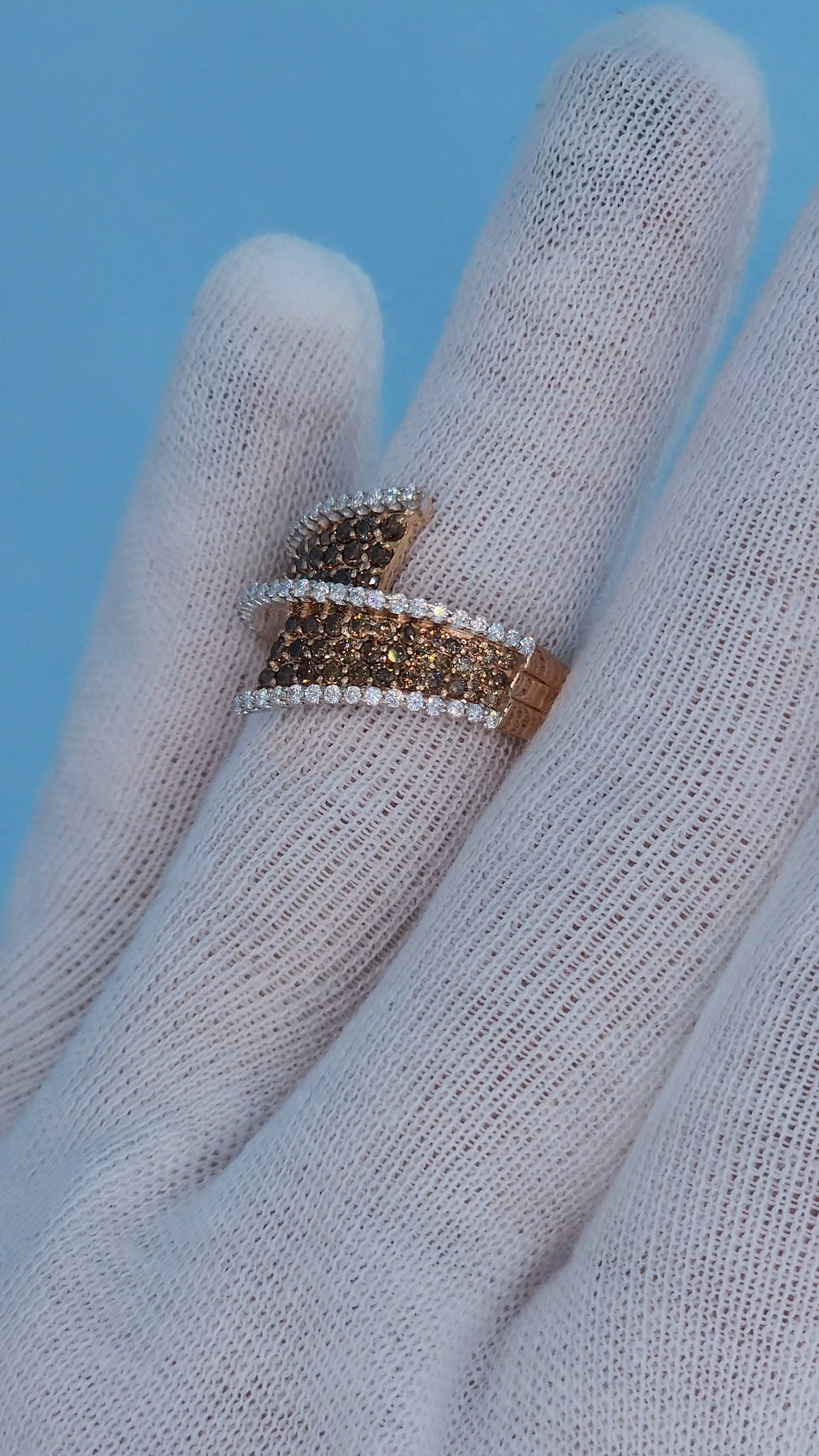 14k Rose Gold Bypass Ring with Cognac and White Diamonds on the Hand in White Glove from the Side