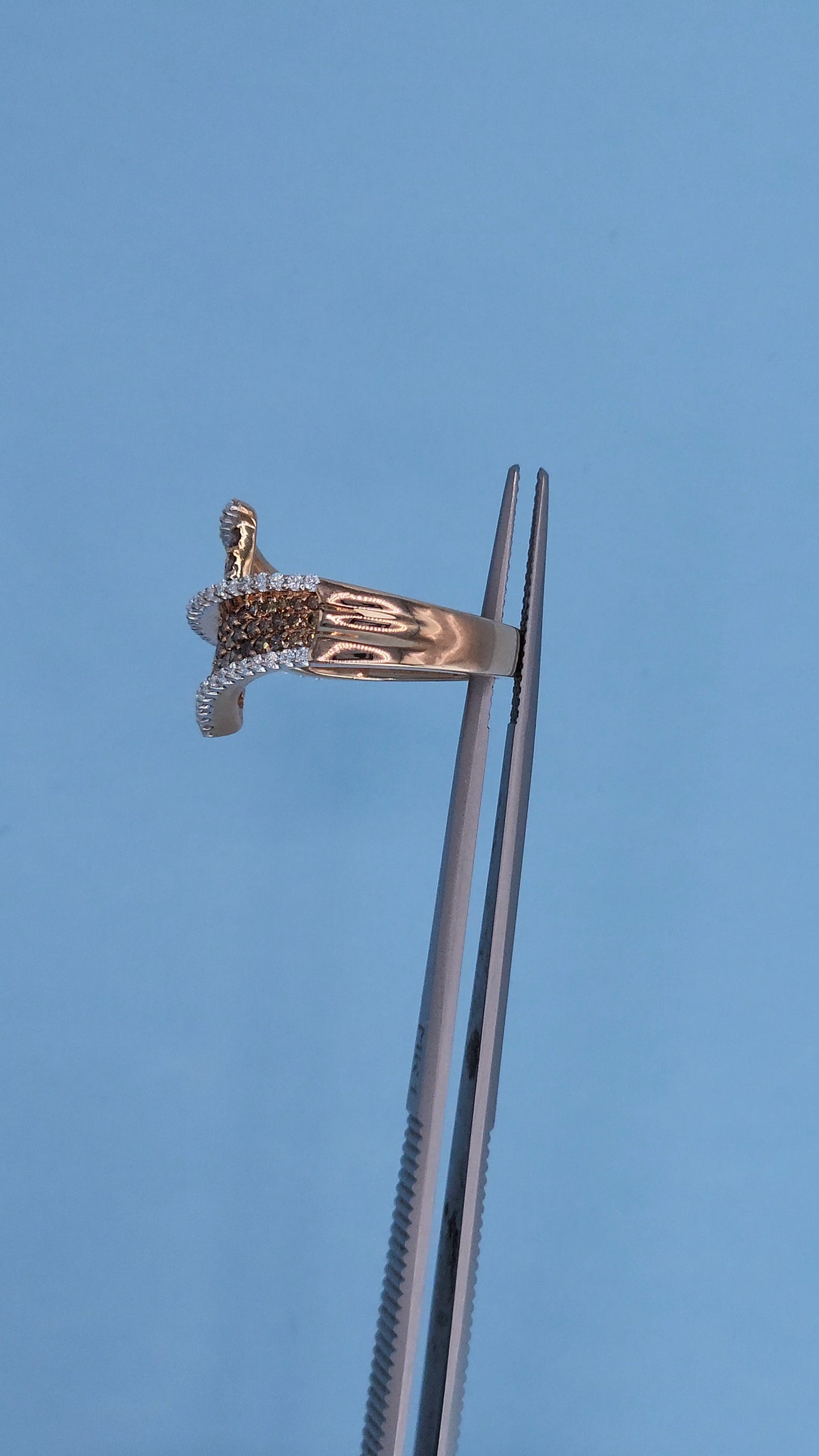 14k Rose Gold Bypass Ring with Cognac and White Diamonds in a Tweezer Side View