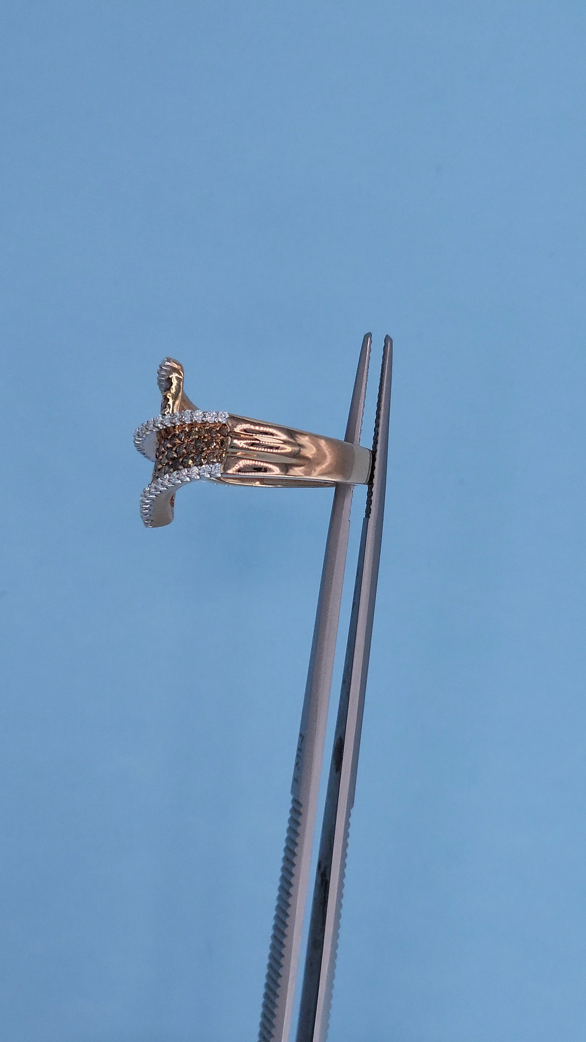 14k Rose Gold Bypass Ring with Cognac and White Diamonds in a Tweezer Side View