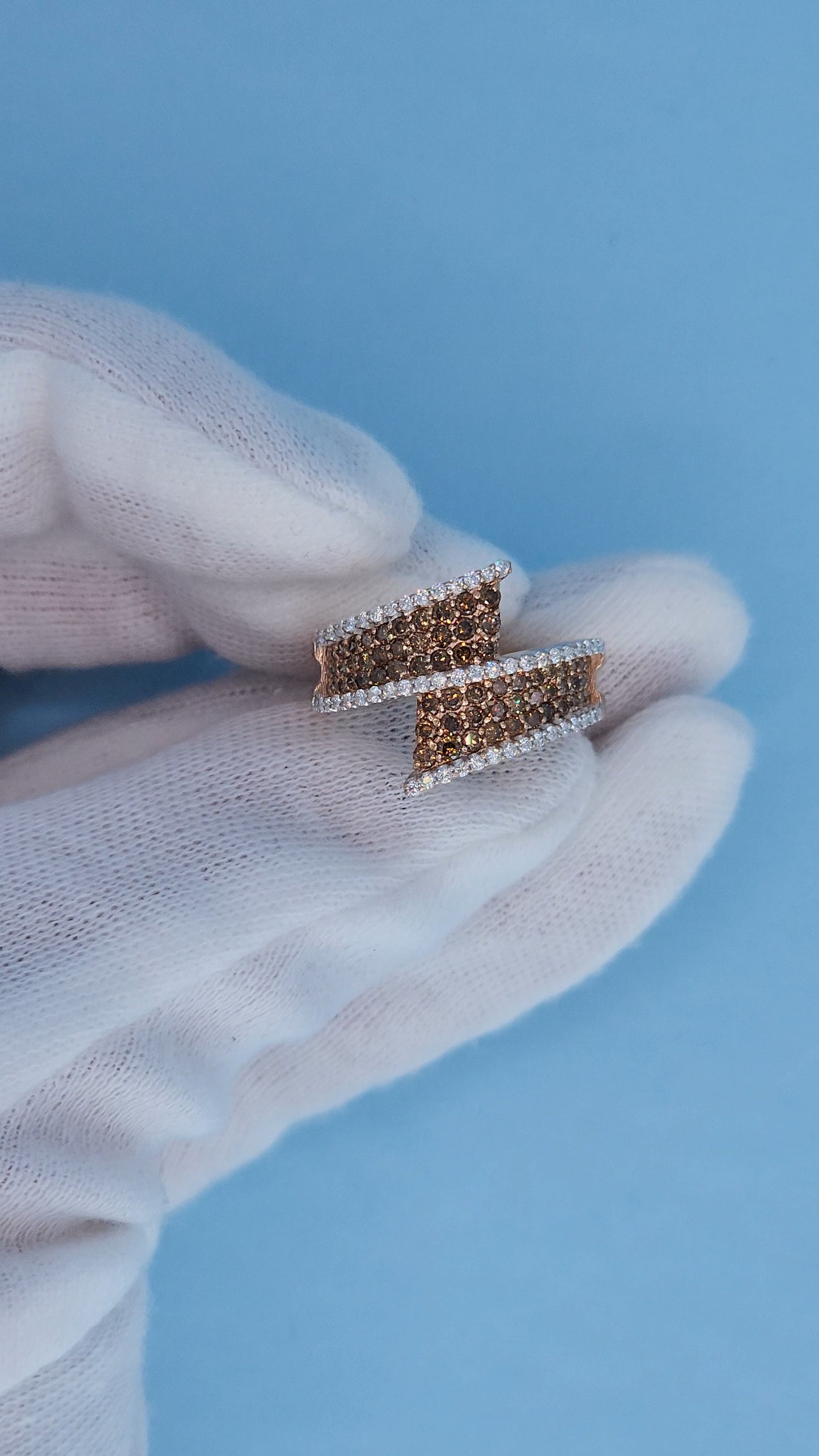 14k Rose Gold Bypass Ring with Cognac and White Diamonds Front View in the Hand