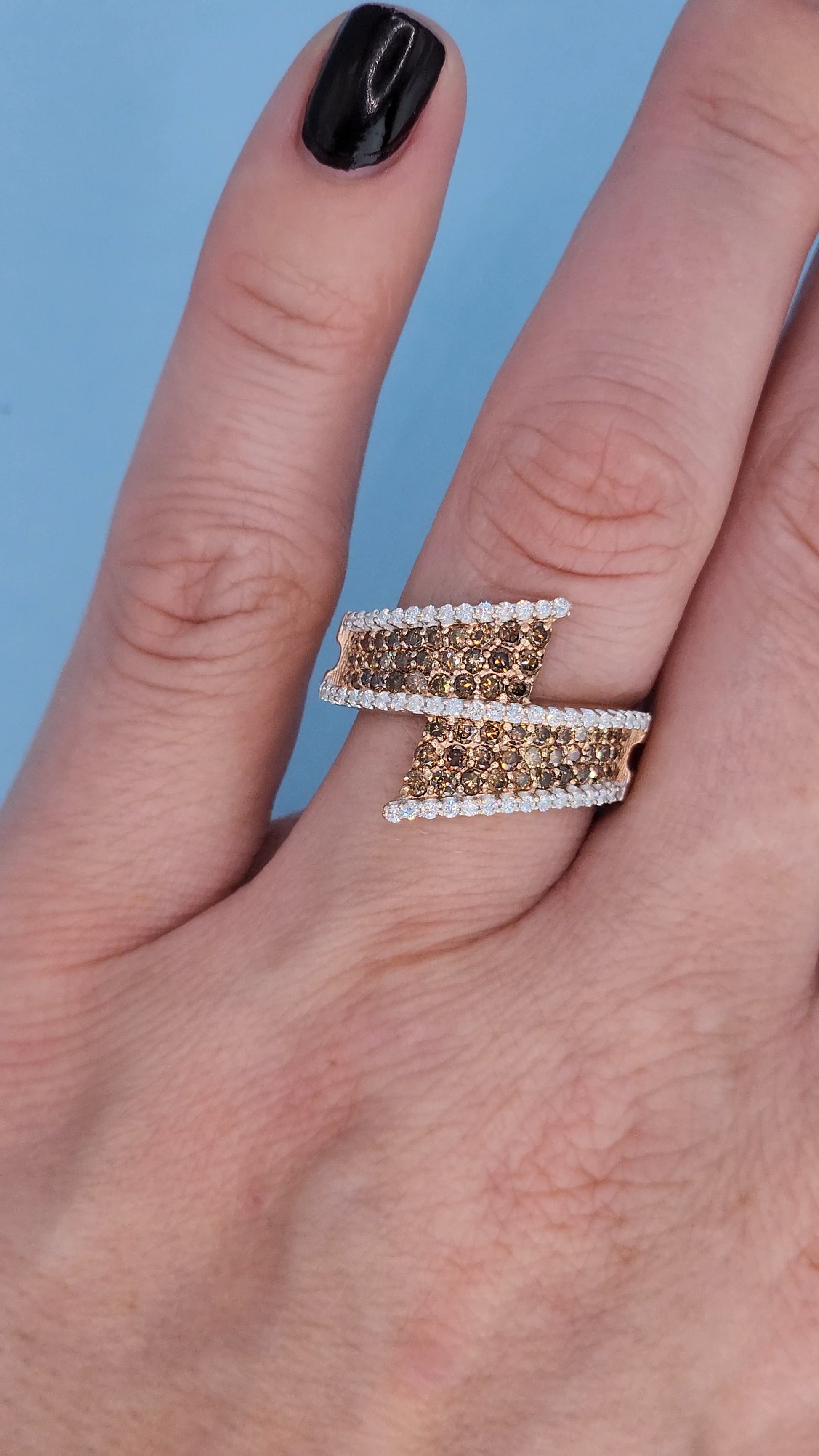 14k Rose Gold Bypass Ring with Cognac and White Diamonds on the hand