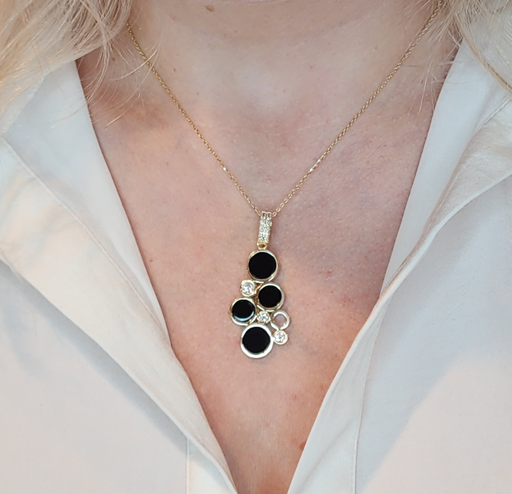 14k Yellow Gold Bubble Pendant with Black Onyx and Diamond Accents on Model