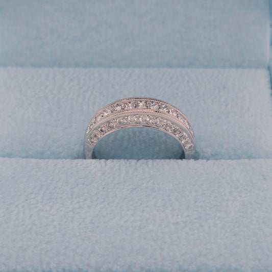 18k white gold three-sided diamond wedding band in blue box