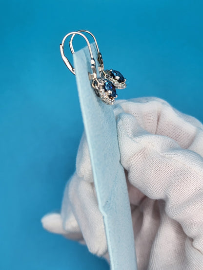 Blue Topaz and Halo Diamonds Dangling Earrings in 14k White Gold