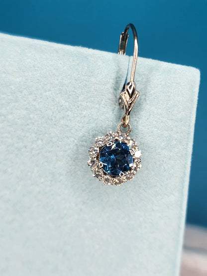 Blue Topaz and Halo Diamonds Dangling Earrings in 14k White Gold