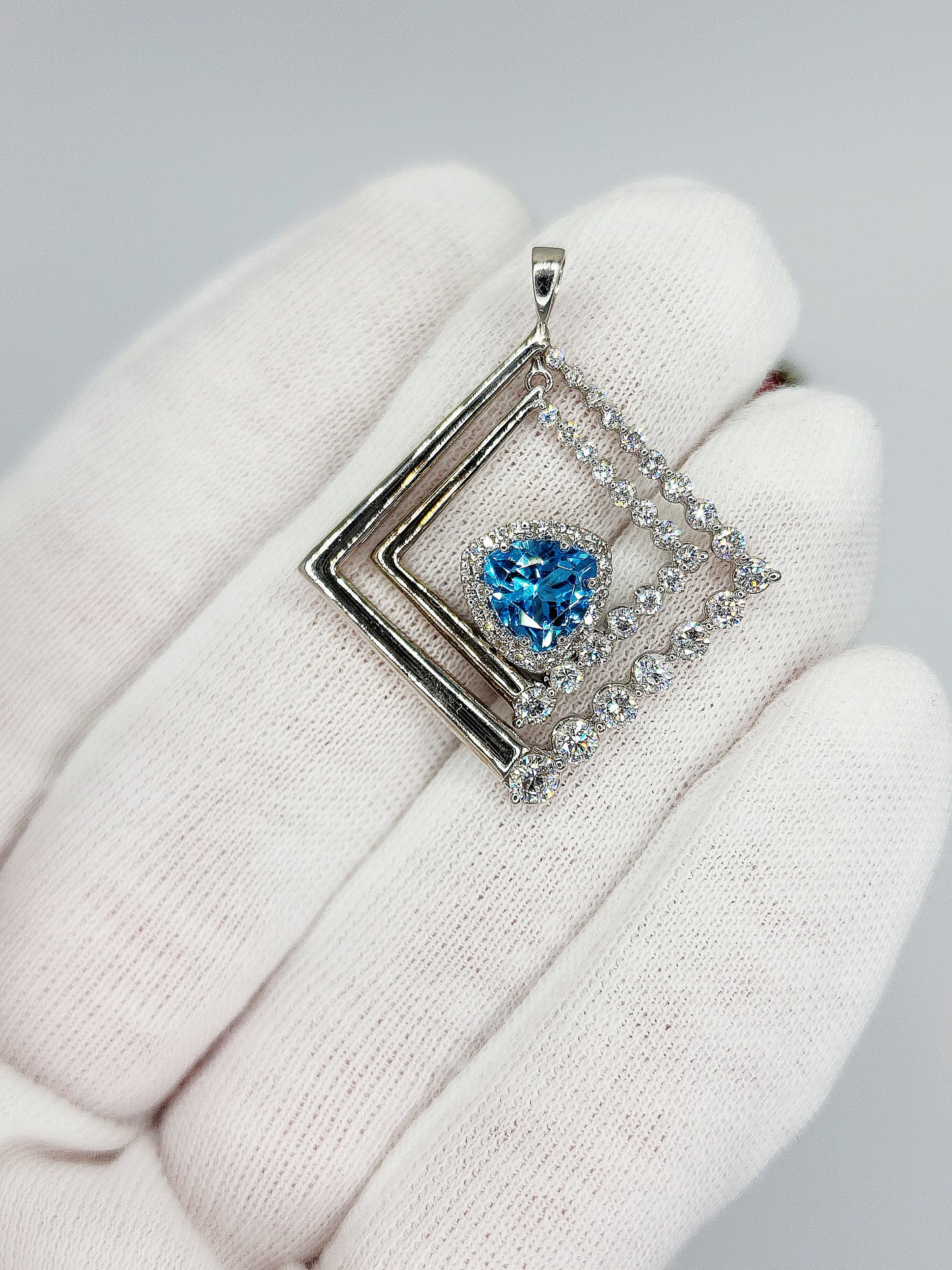 Diamond and Trillion Cut Blue Topaz Necklace in 14K White Gold