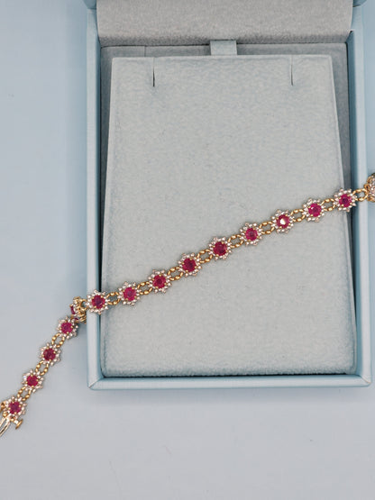 Ladies Flower Motif Ruby and Diamond Tennis Bracelet in 14k Yellow Gold