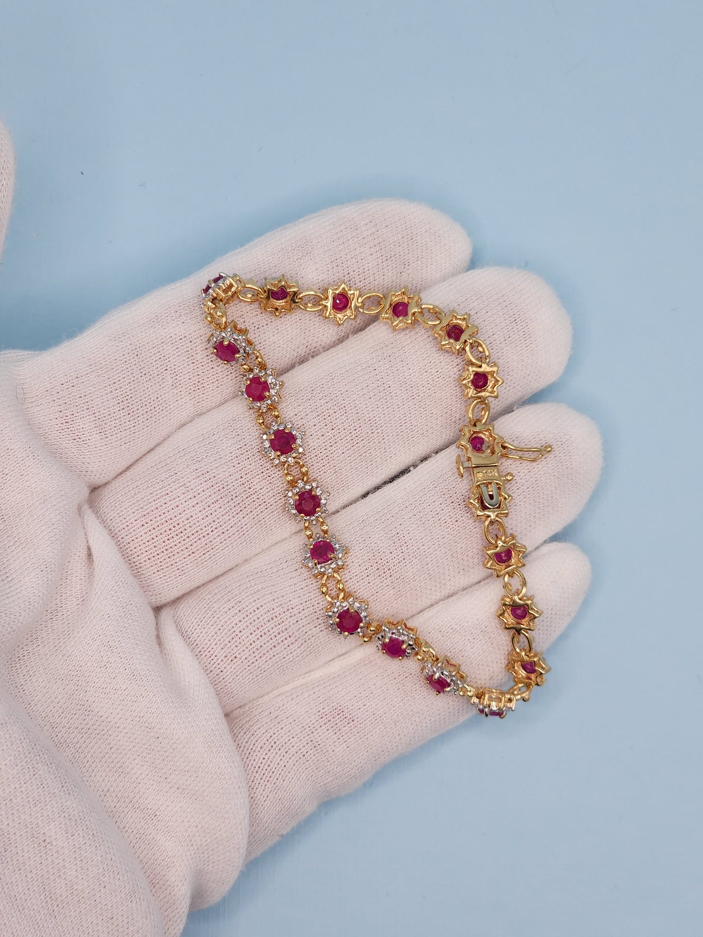 Ladies Flower Motif Ruby and Diamond Tennis Bracelet in 14k Yellow Gold