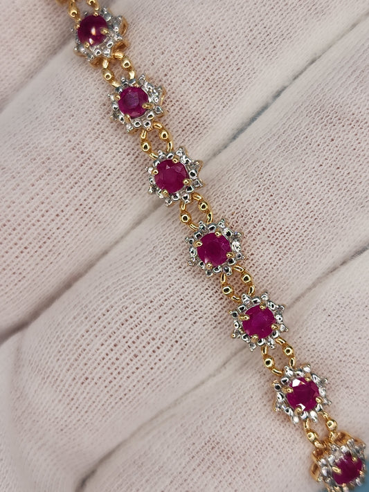 Ladies Flower Motif Ruby and Diamond Tennis Bracelet in 14k Yellow Gold