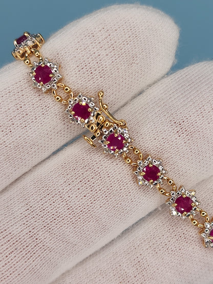 Ladies Flower Motif Ruby and Diamond Tennis Bracelet in 14k Yellow Gold