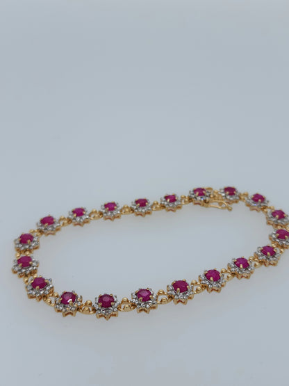 Ladies Flower Motif Ruby and Diamond Tennis Bracelet in 14k Yellow Gold