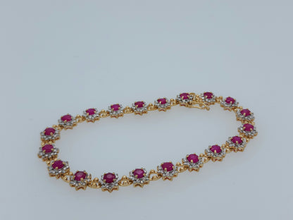 Ladies Flower Motif Ruby and Diamond Tennis Bracelet in 14k Yellow Gold